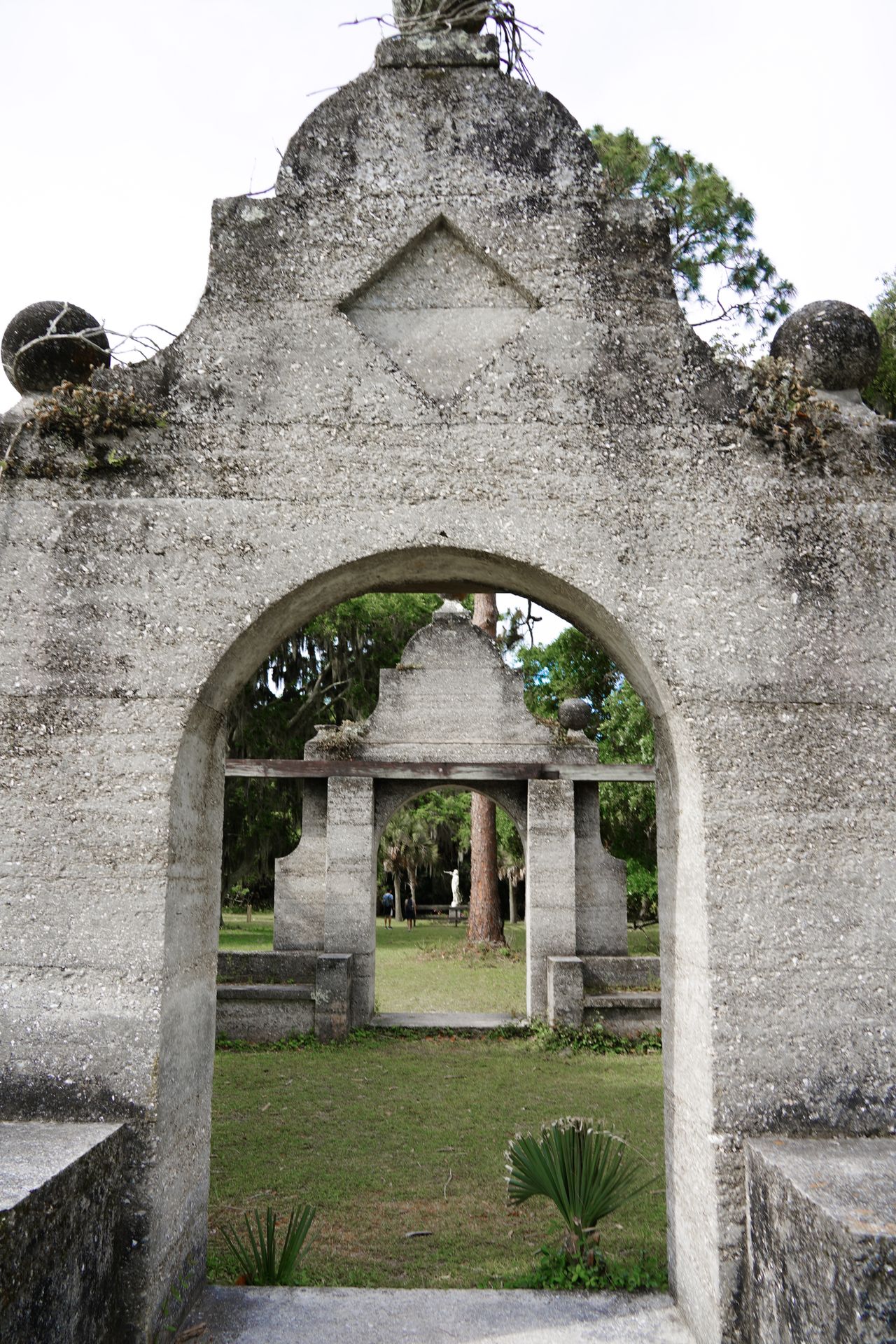 Looking through an arch at ruins of the Dungeness Mansion on Cumberland Island