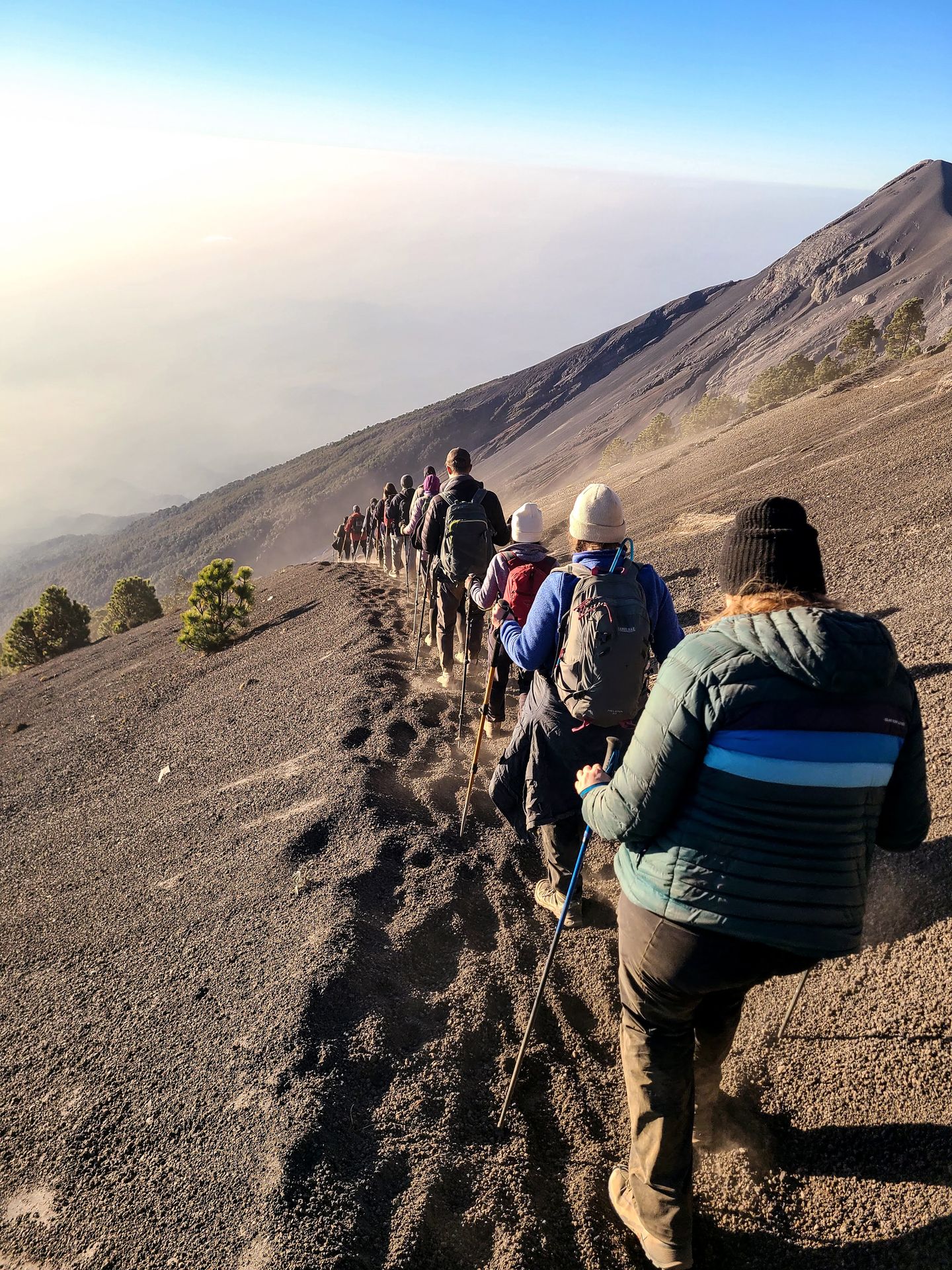 Lydia and a line of hikers going down from the Acatenango Peak