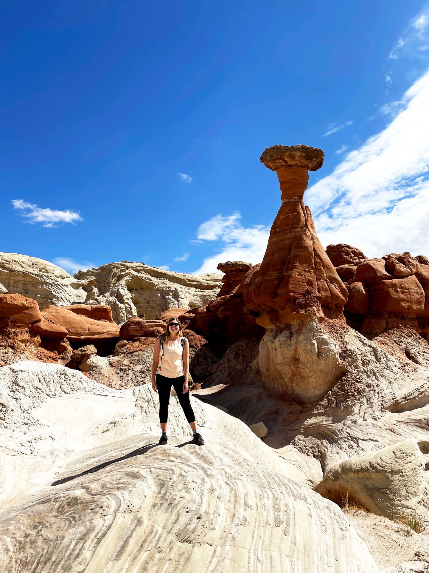 Lydia standing with hoodoos behind her.