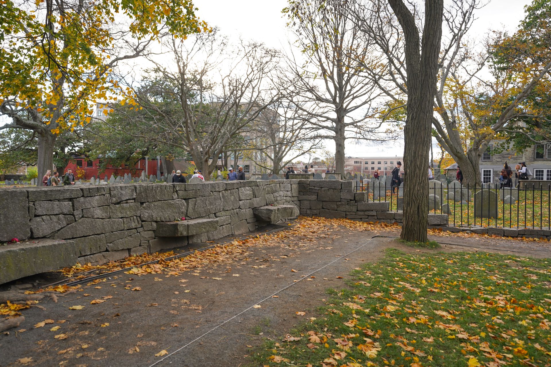 A stone wall with certain pieces coming out at the Salem Witch Trials Memorial
