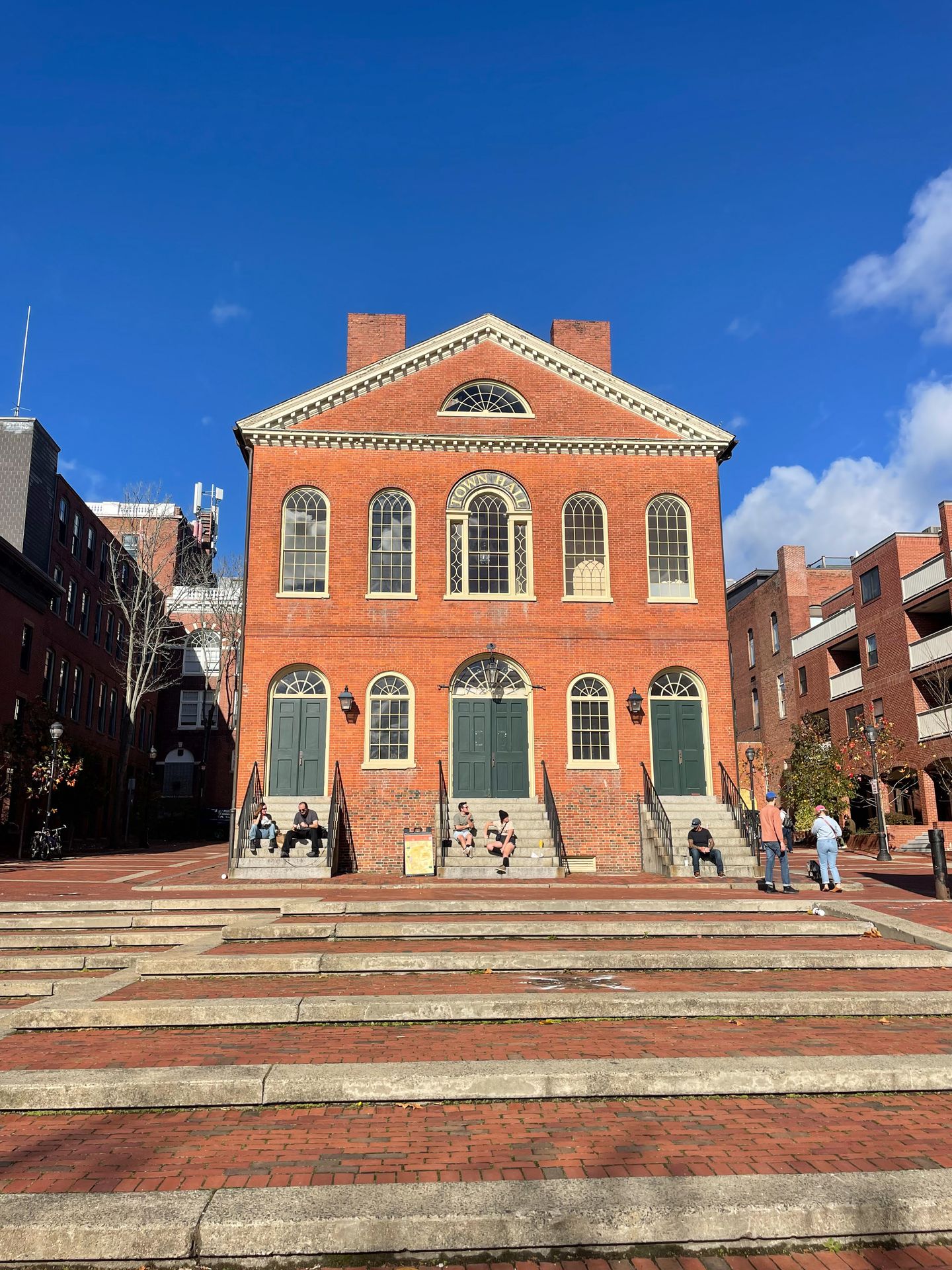 The Salem Town Hall, a brick building. The square in fromt of the building is made up of brick steps