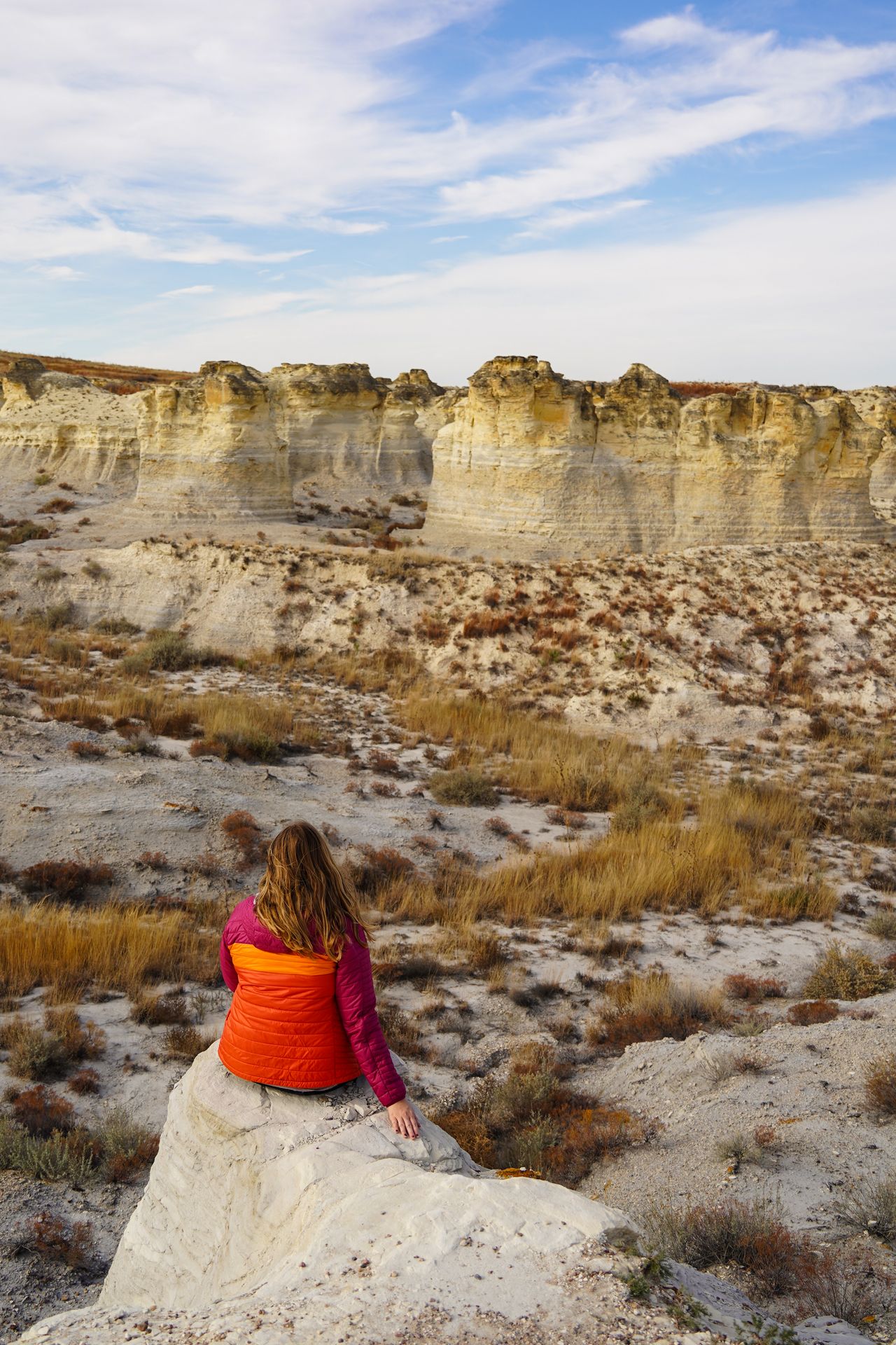 Lydia sitting and looking out a view of Little Jerusalem State Park