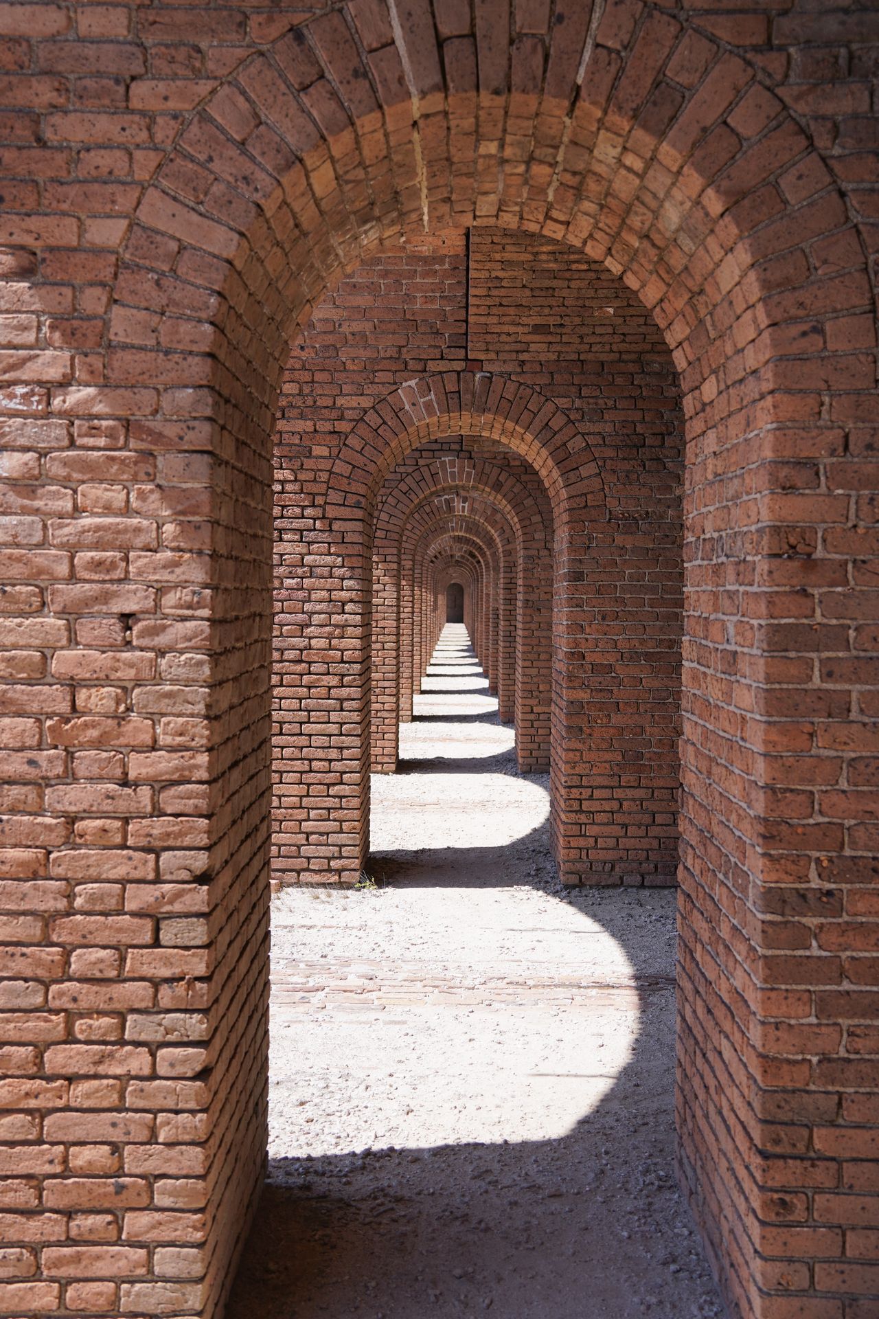 A long stretch of arches that you can walk through inside of Fort Jefferson