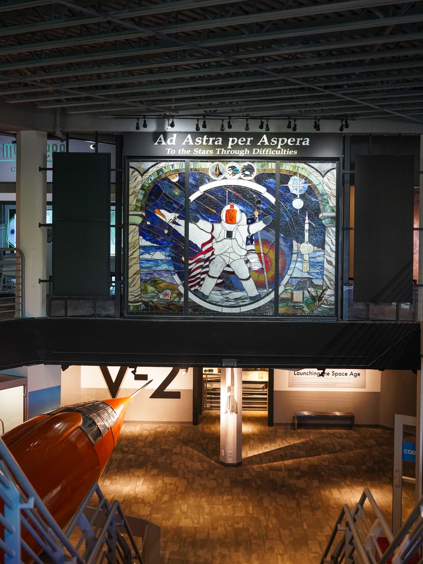 A mosaic of an astronaut with the phrase 'Ad Astra per Aspera' inside the Cosmosphere Museum