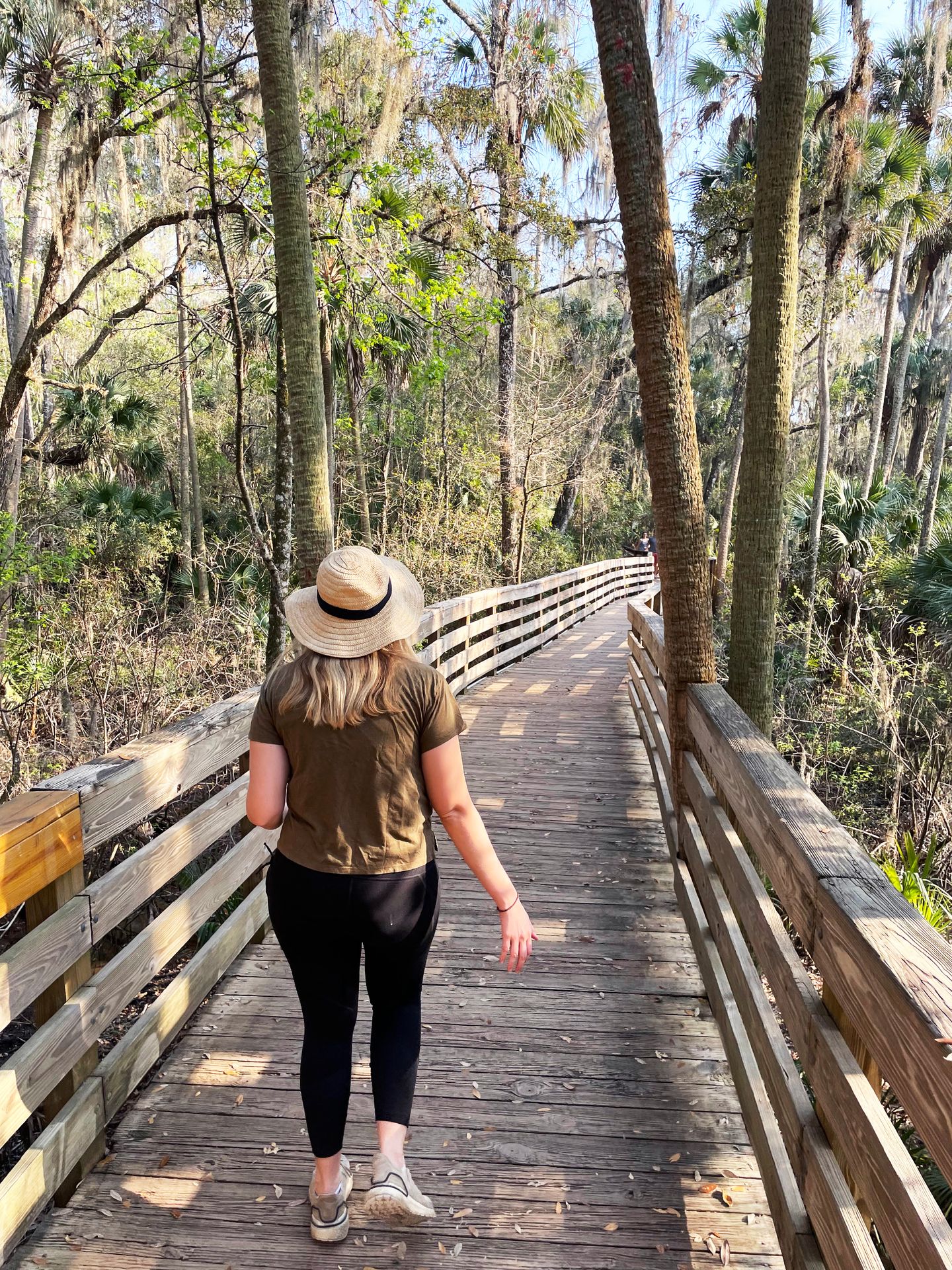 Lydia walking the boardwalk in Blue Spring State Park.