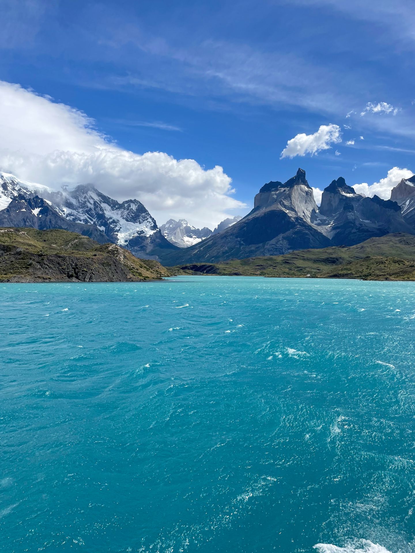 A view of Lake Pehoe and jagged mountain peaks in the distance.