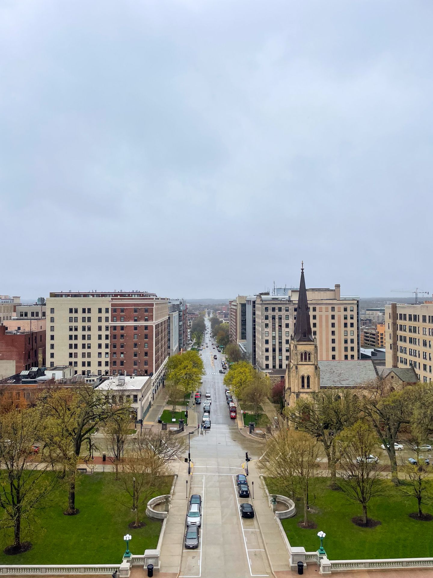 A view looking straight down a street in downtown Madison from the state capitol observation deck.