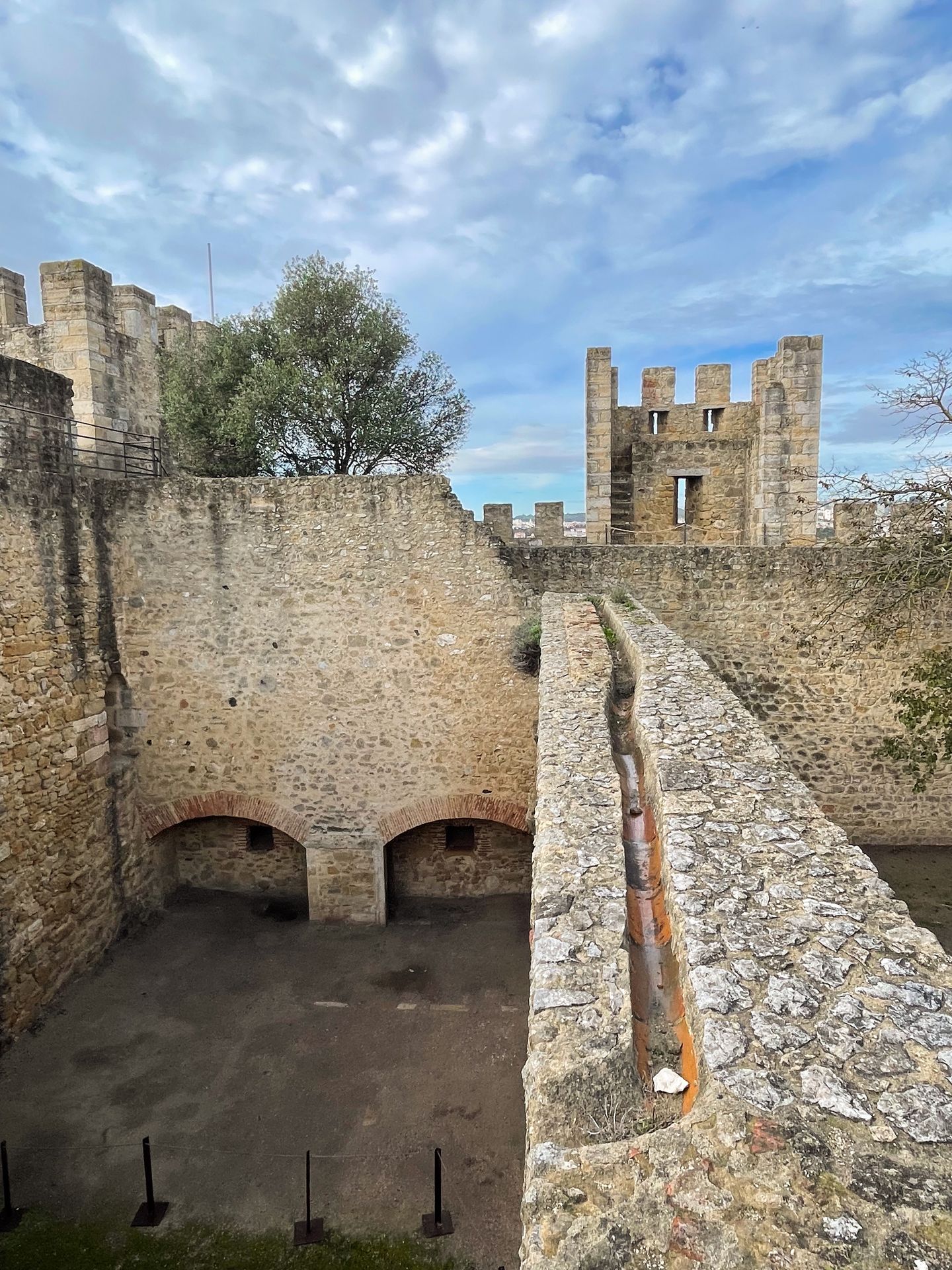 Walking along the top of the fortress walls at Castelo de S. Jorge