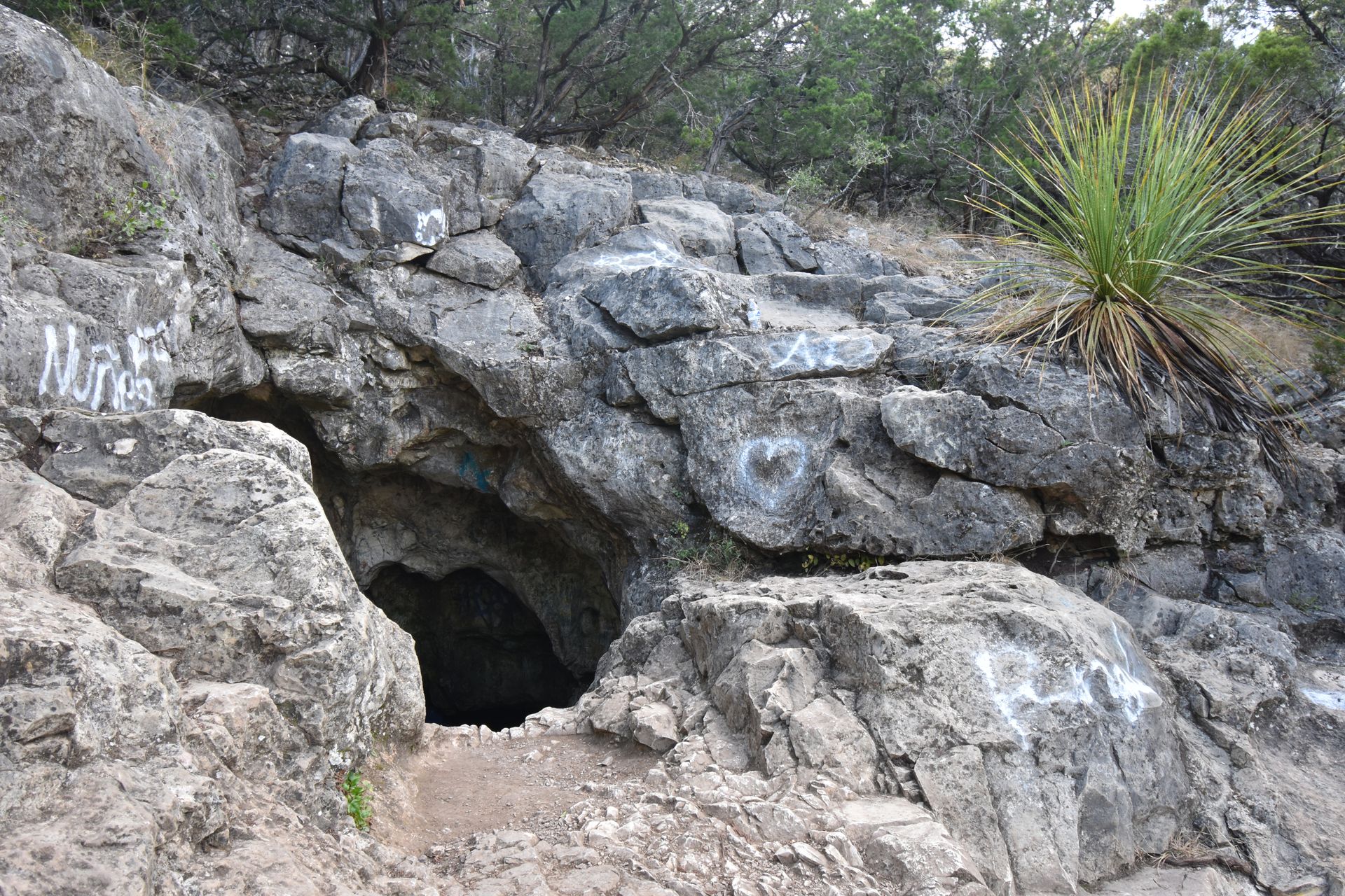 Looking at the Crystal Cave, which you climb down into from a rock face.
