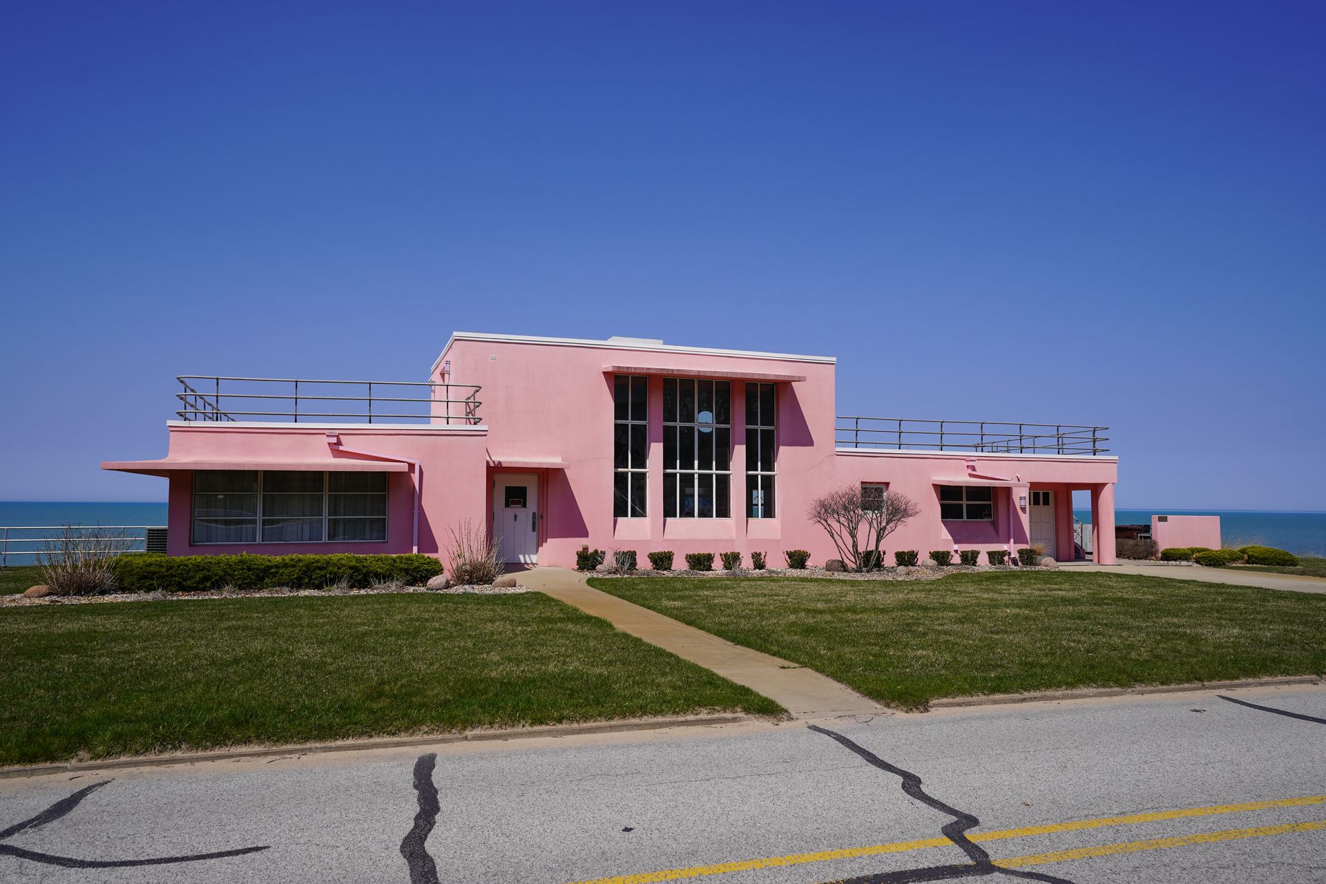 A pink house that is part of the Century of Progresss Homes created in the 1933 Chicago World's Fair
