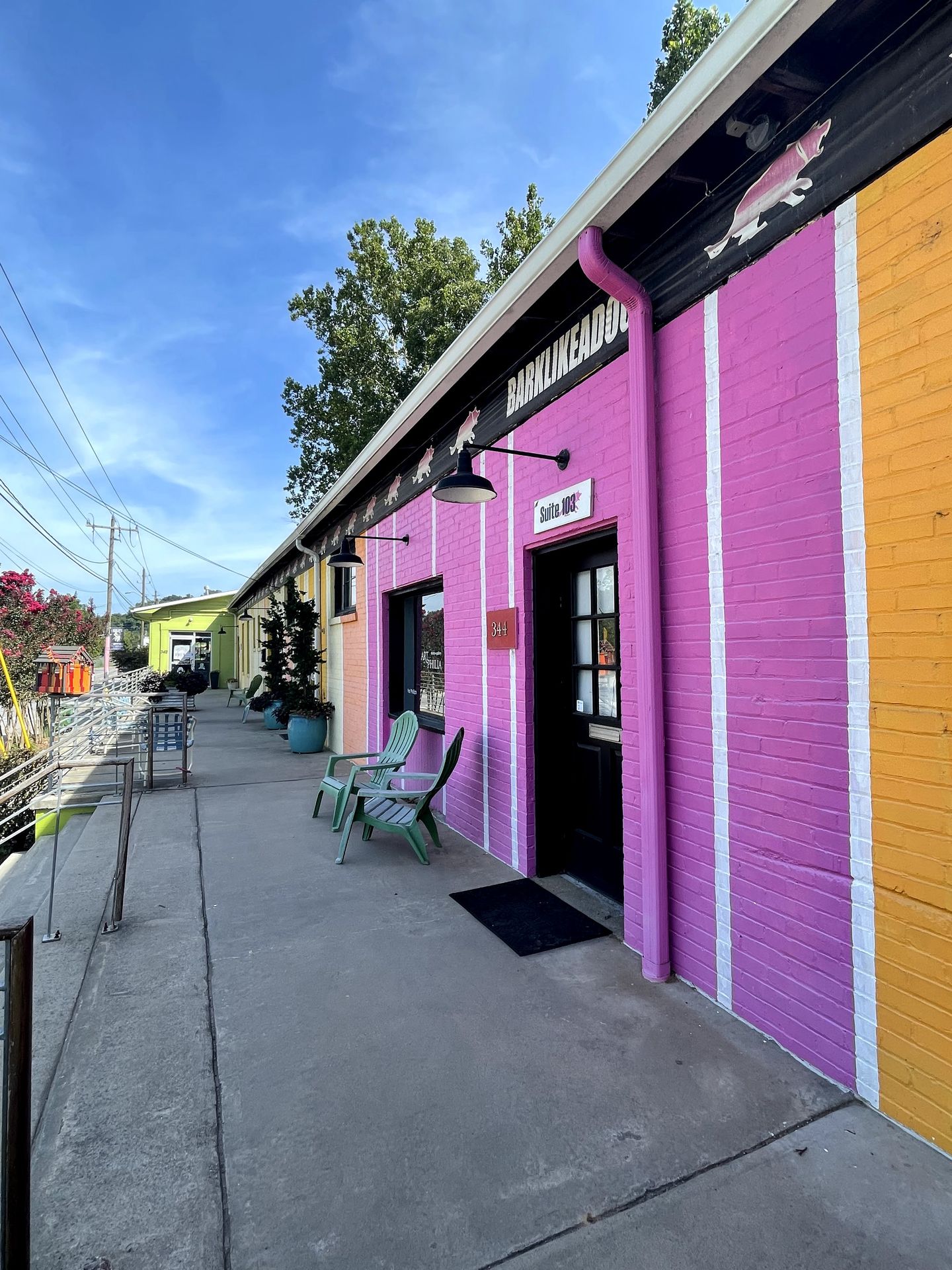 Buildings painted in pink and orange in the River Arts District.