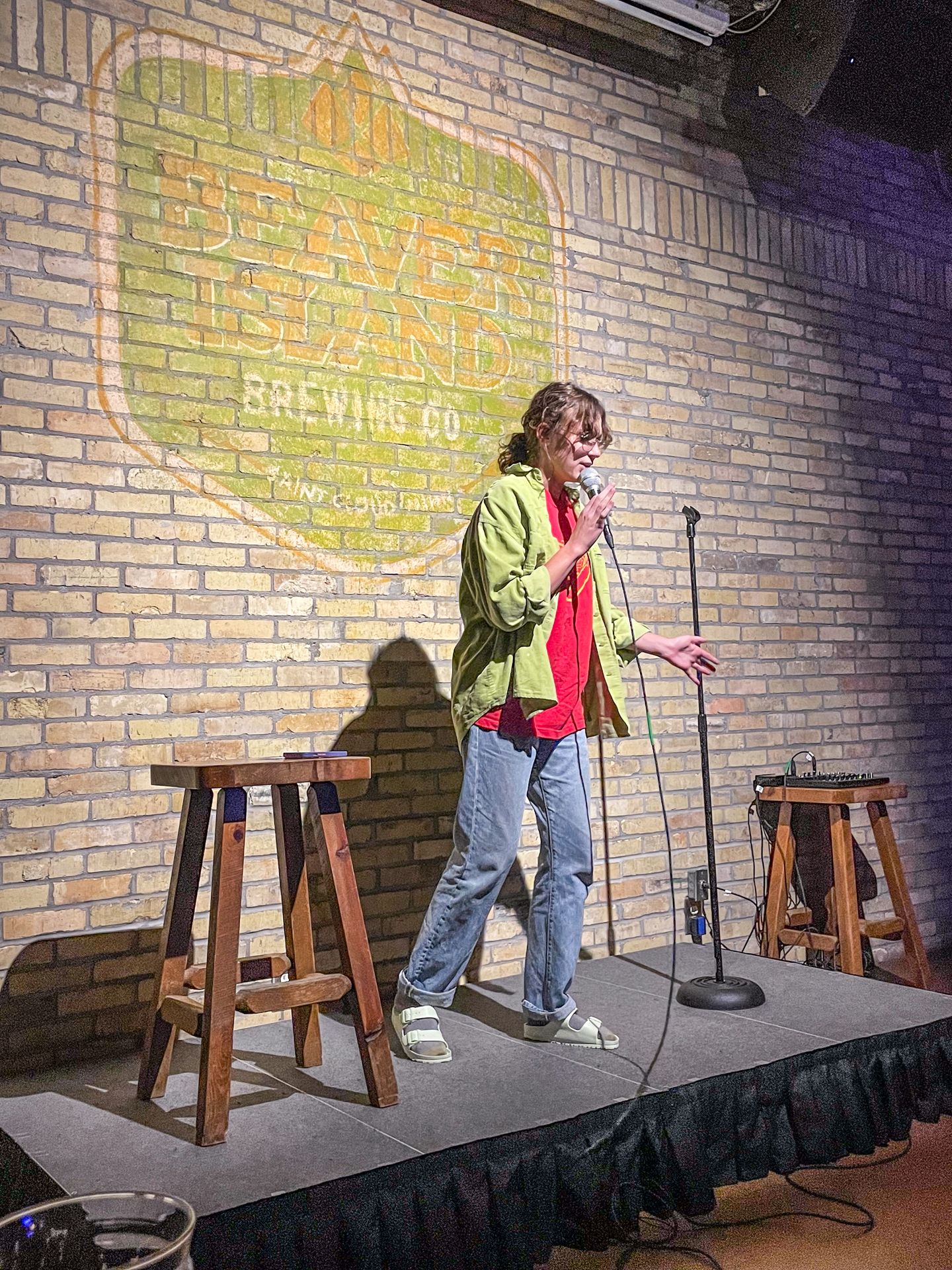 A comedian on stage at Beaver Island Brewing