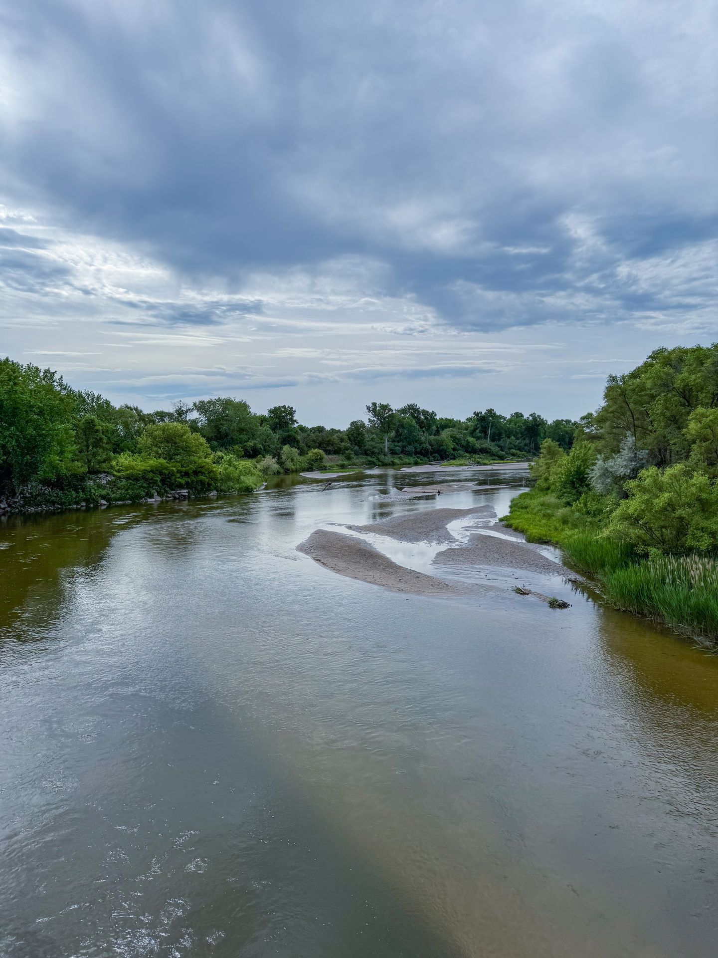 The Elkhorn River, which is wide with some sandy portions, as seen from the Cowboy Trail