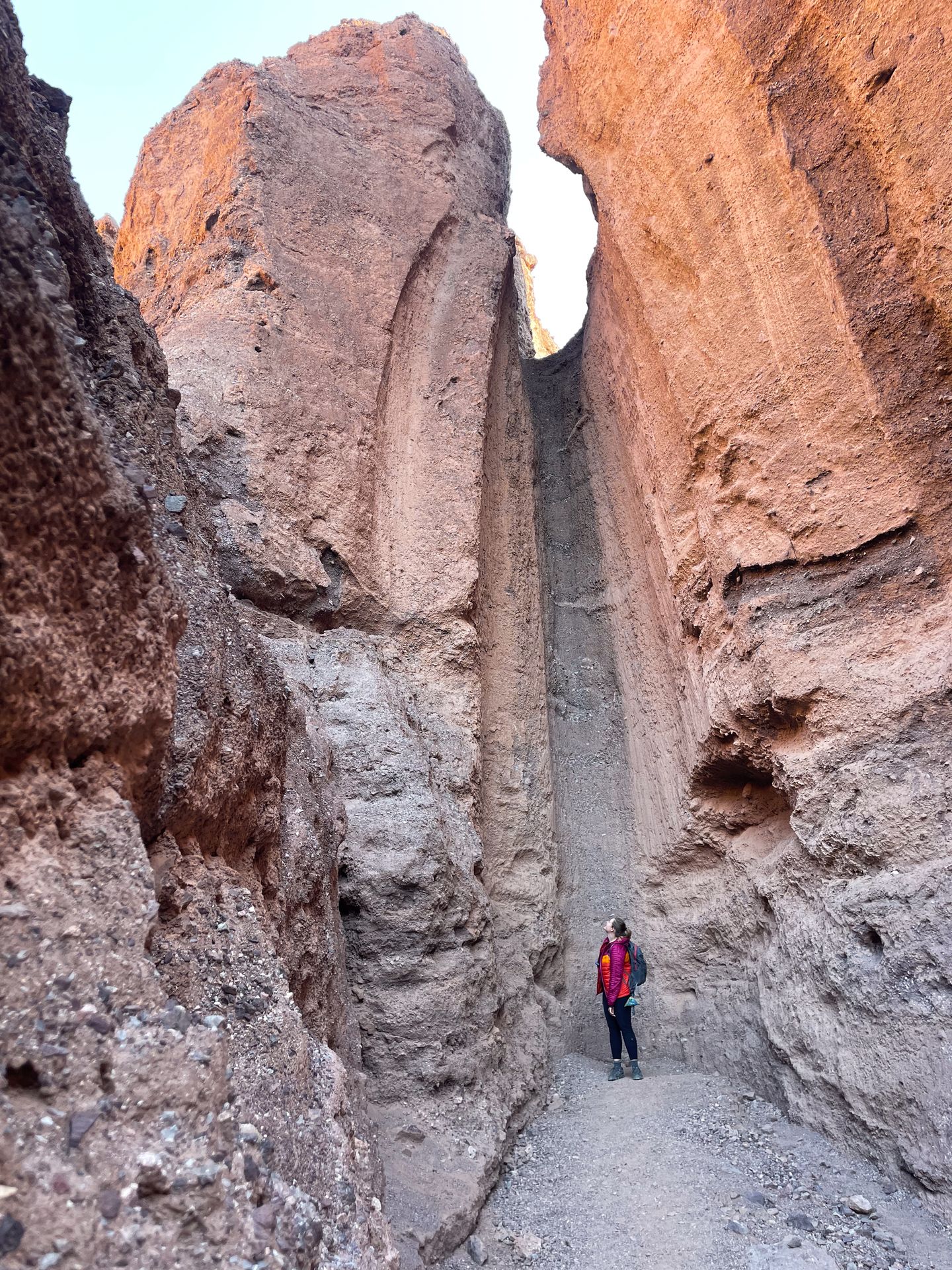 Lydia standing in an area that used to contain a waterfall on the Natural Bridge Trail.