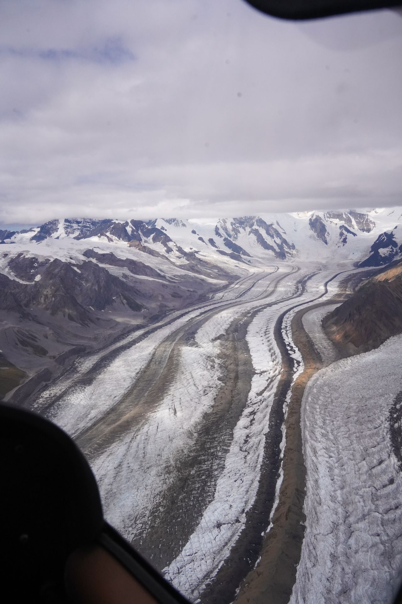 A view looking down over the Root Glacier while flightseeing in Wrangell-St. Elias National Park