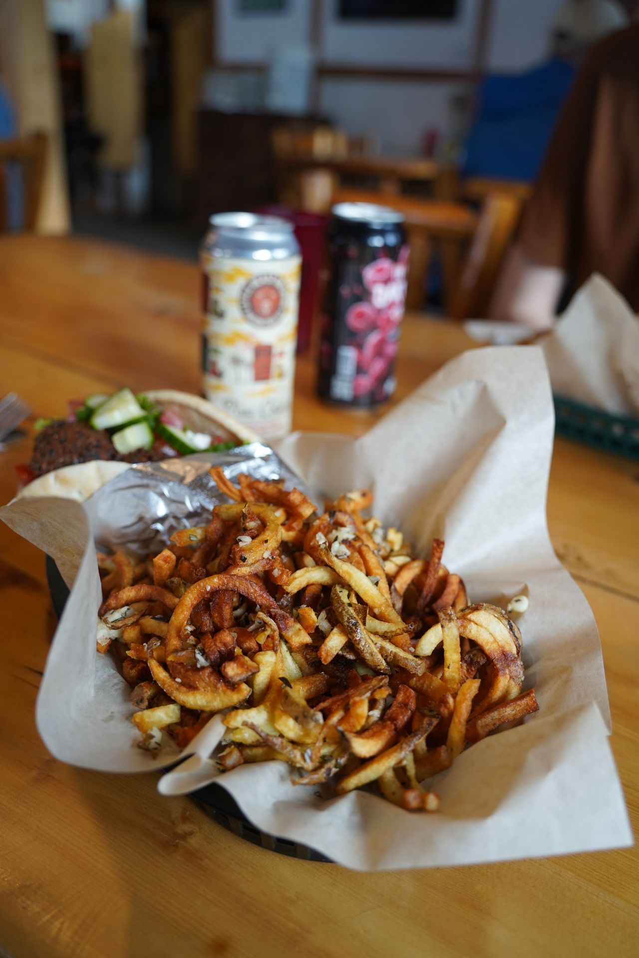 A basket of curly fries from The Potato