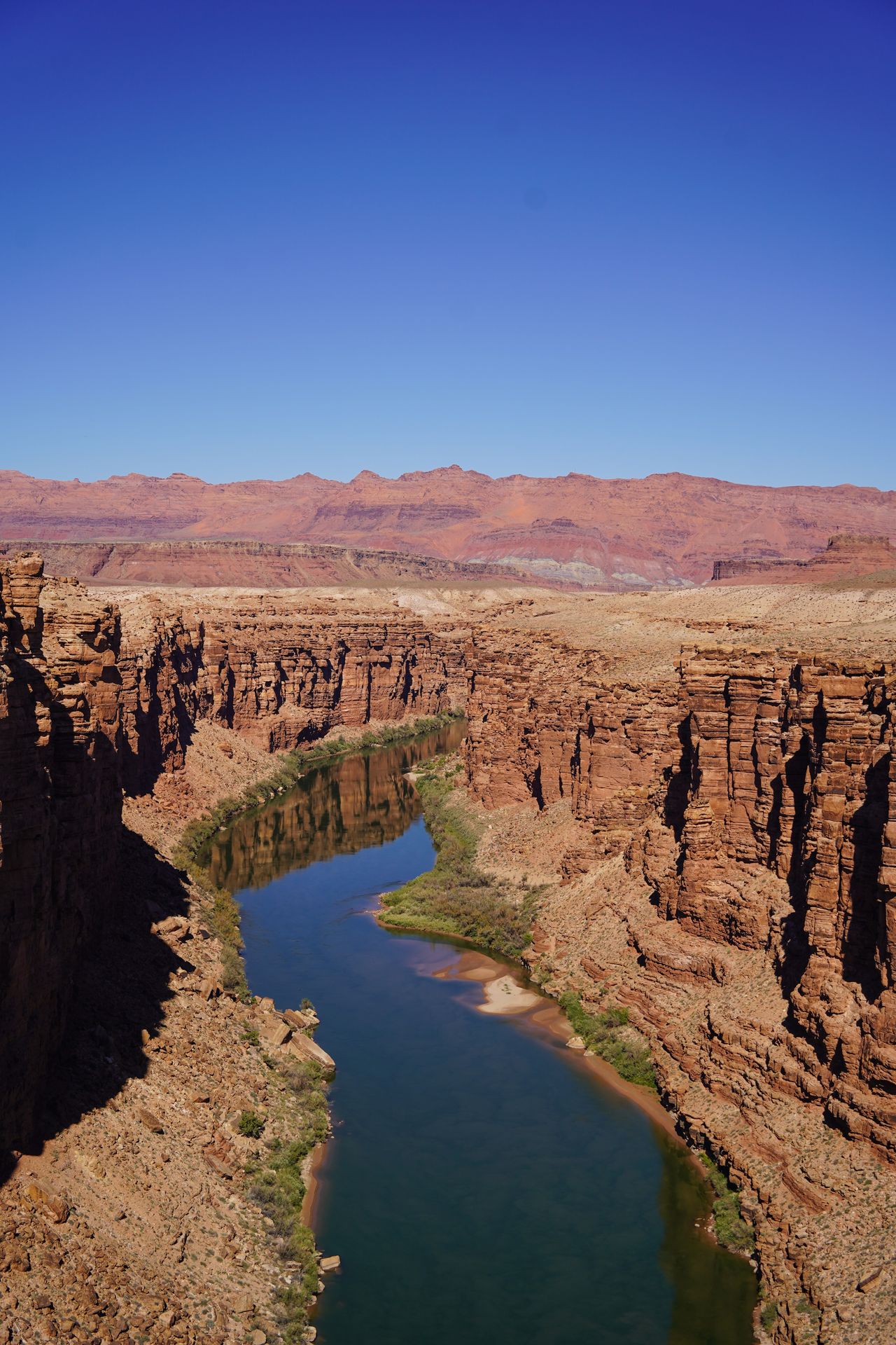 A view of the Colorado River flowing through the Glen Canyon, seen from Navajo Bridge