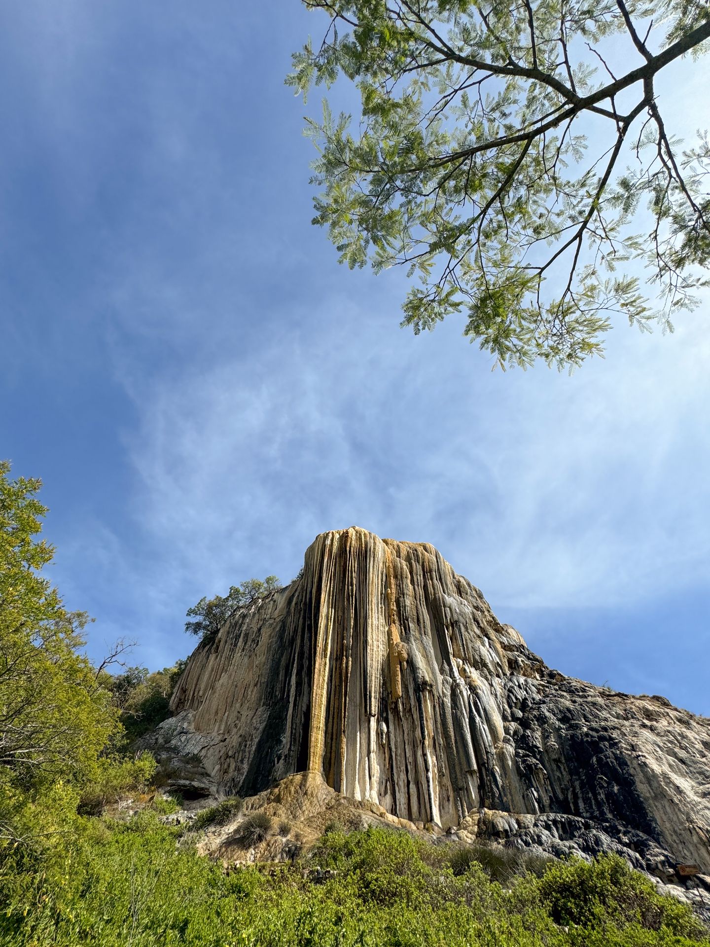Looking up at a petrified waterfall at Hierve el Agua