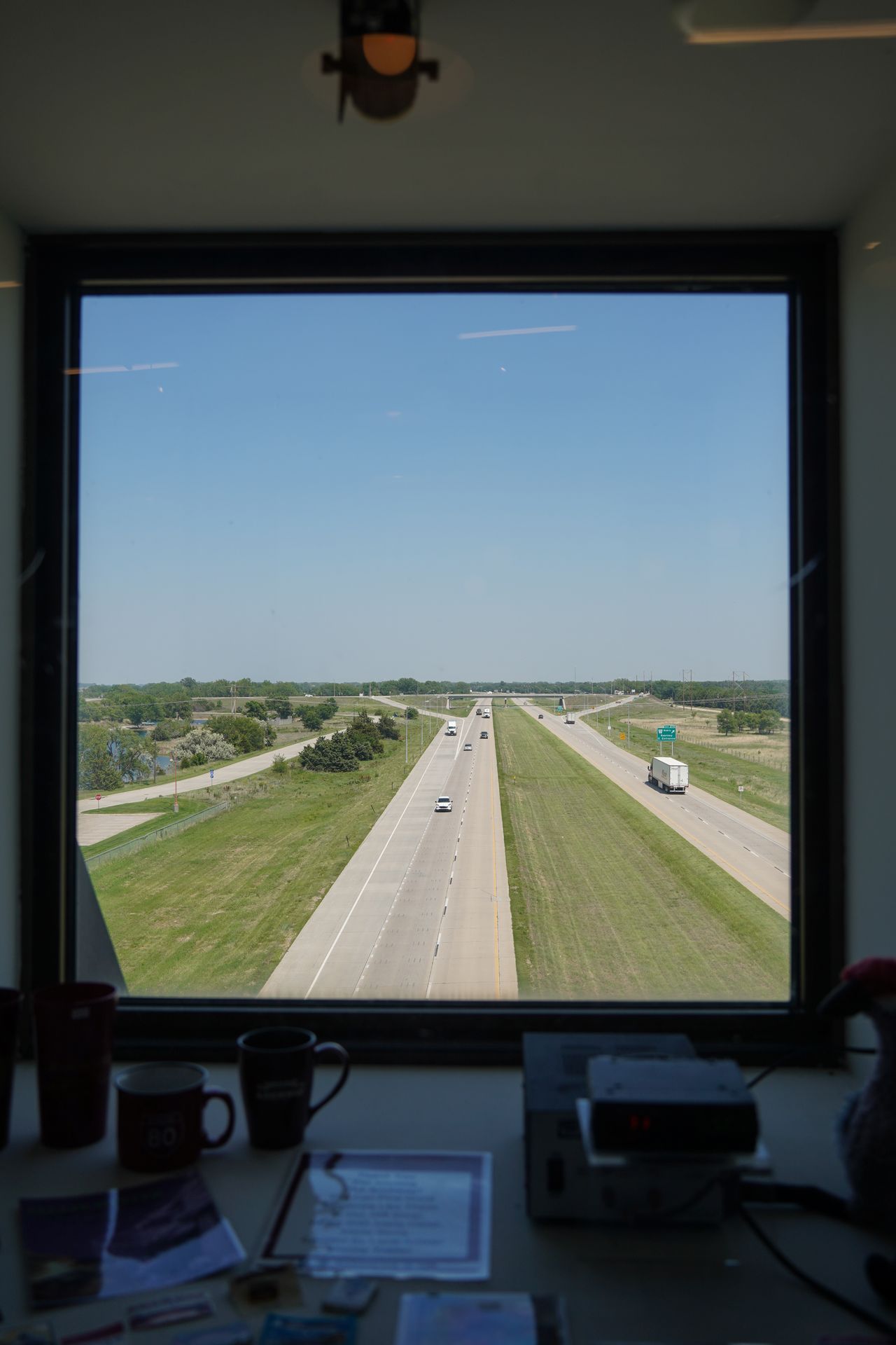 A window looking down at I-80 inside The Archway Museum