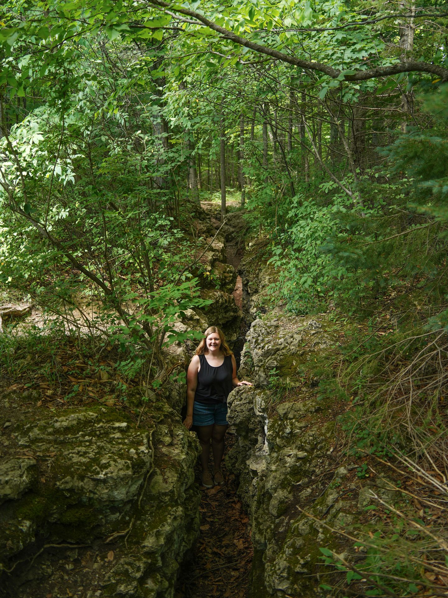 Lydia standing down inside the Crack in the Island.