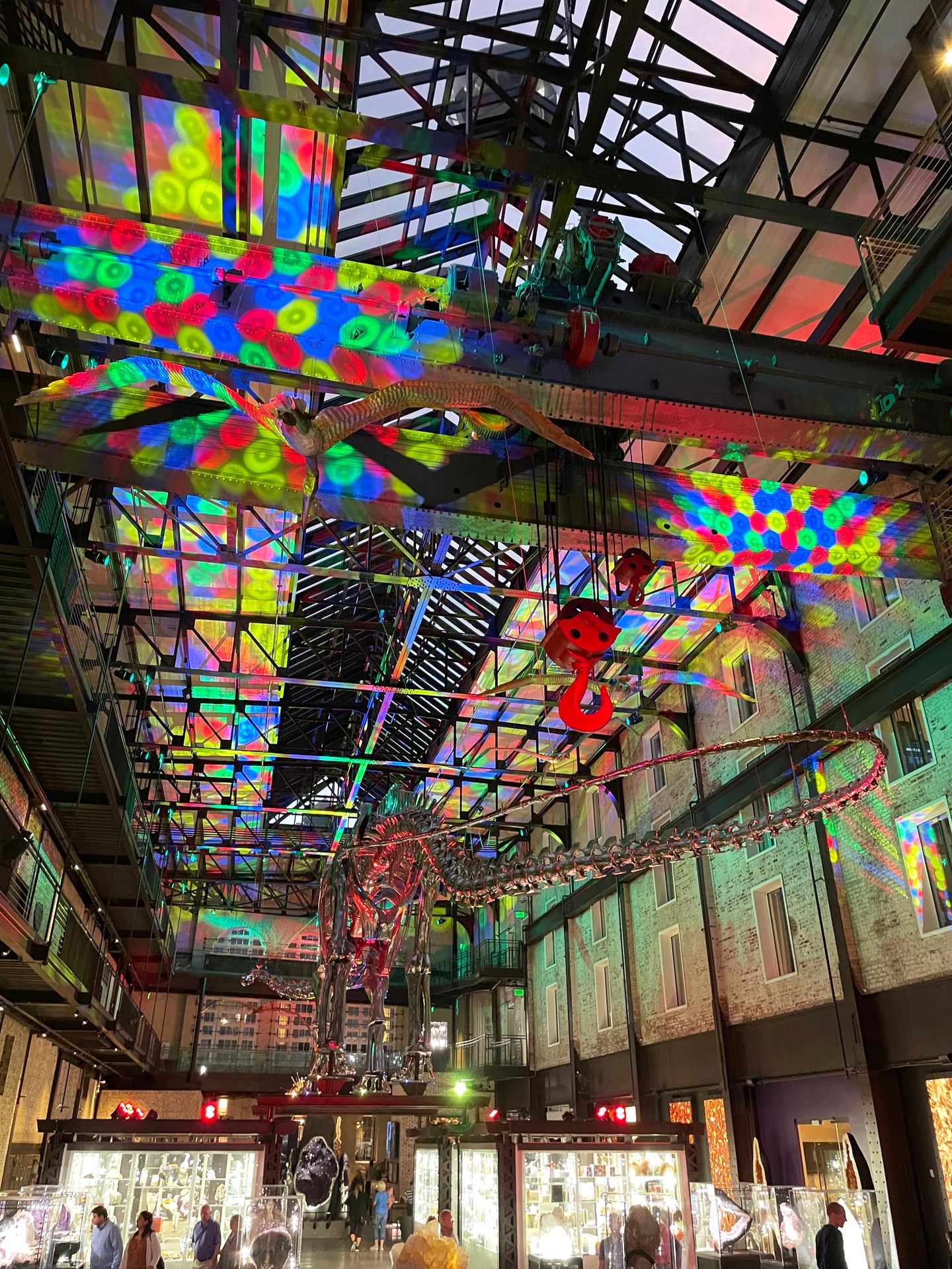 Looking up at the lobby at JW Marriot Hotel Lobby. The ceiling is covered in colorful lights