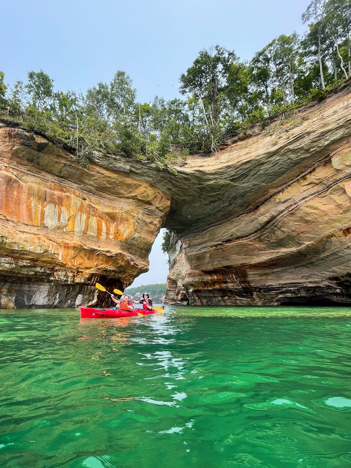 Lydia and Joe kayaking through Lover's Arch