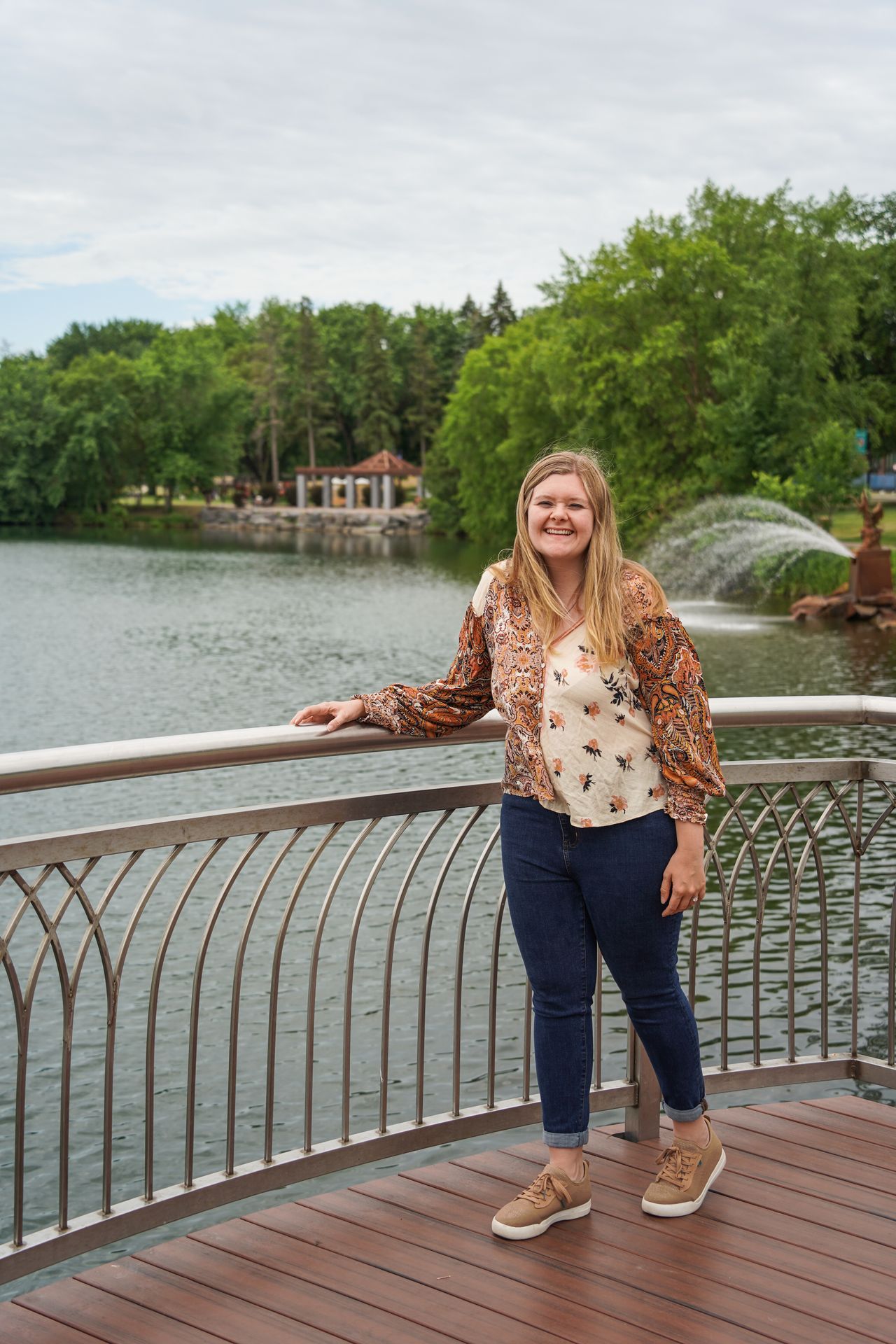 Lydia standing next to Lake George