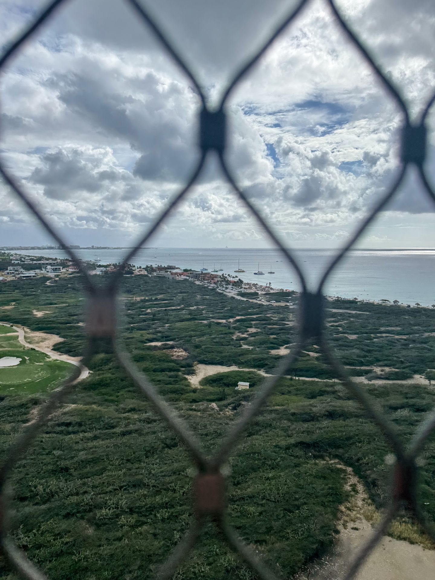 The view through chain links from the top of the California Lighthouse