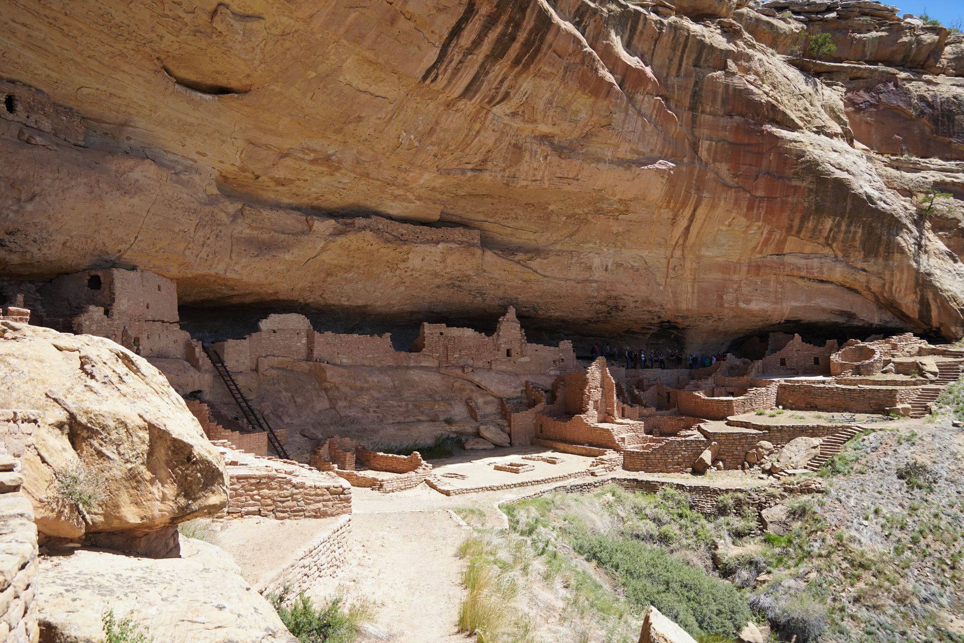 Looking at several buildings inside of Long House