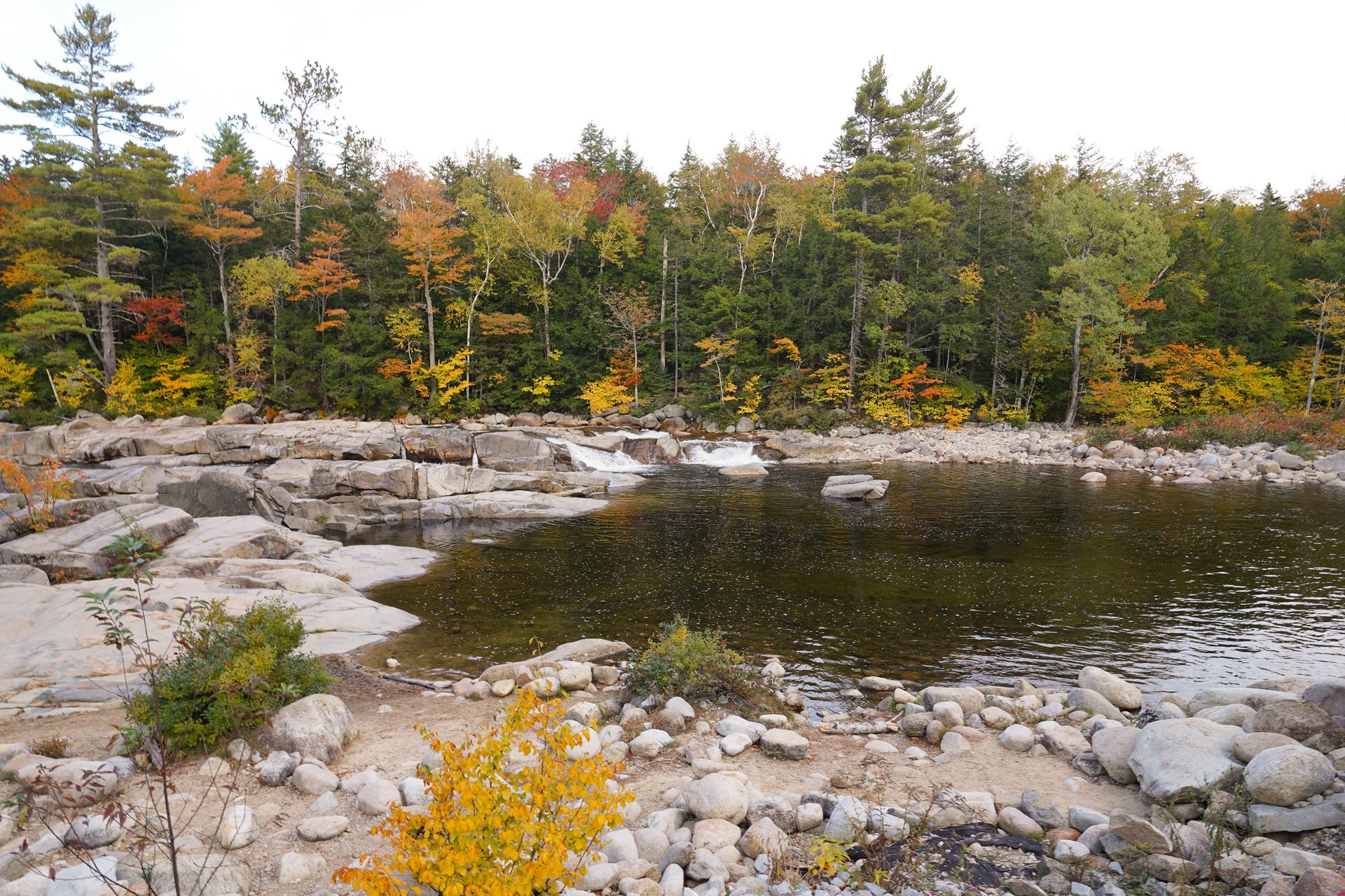 A small waterfall among large boulders at Lower Falls along the Kanc Highway