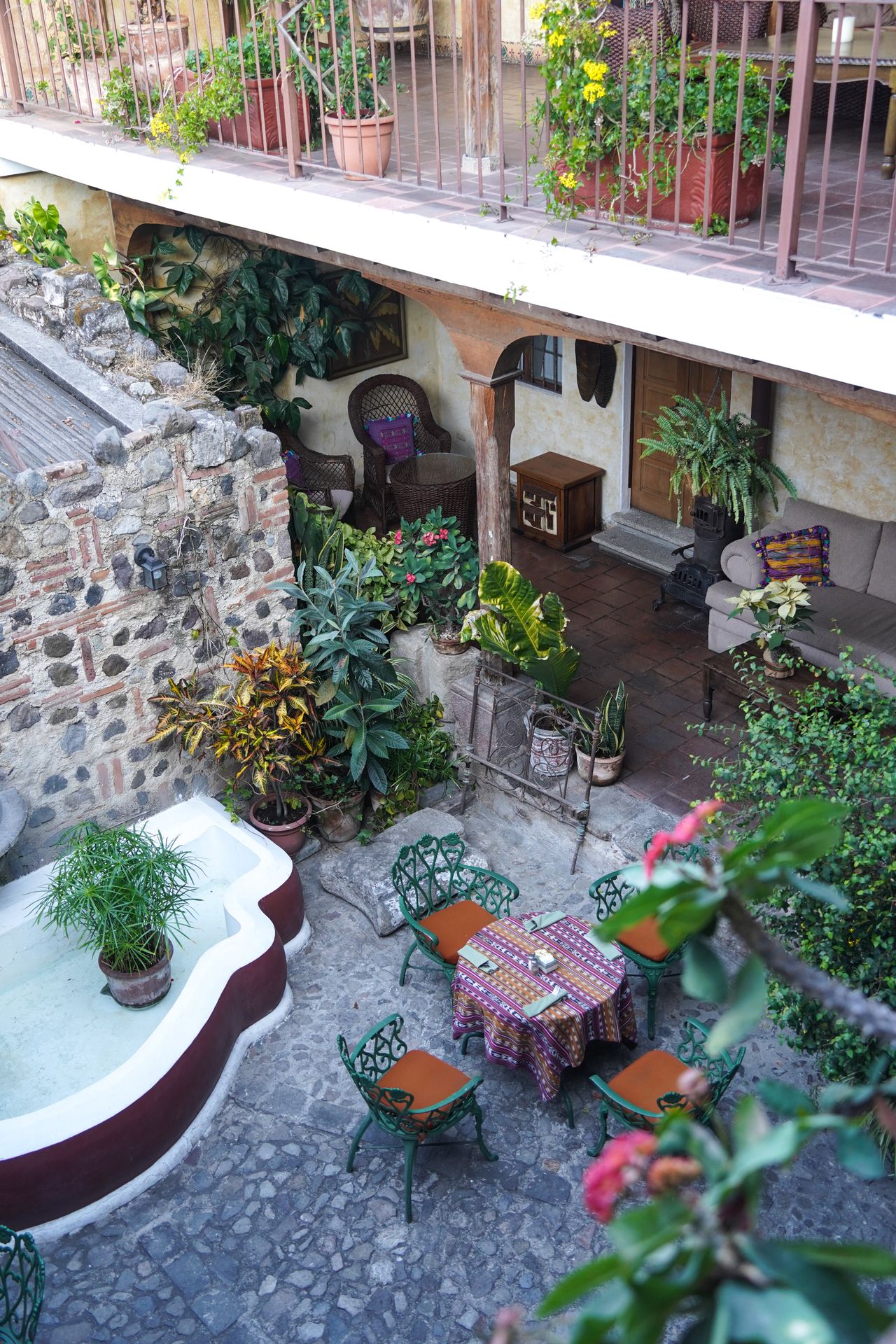A colorful courtyard in the center of Hotel El Meson de Maria