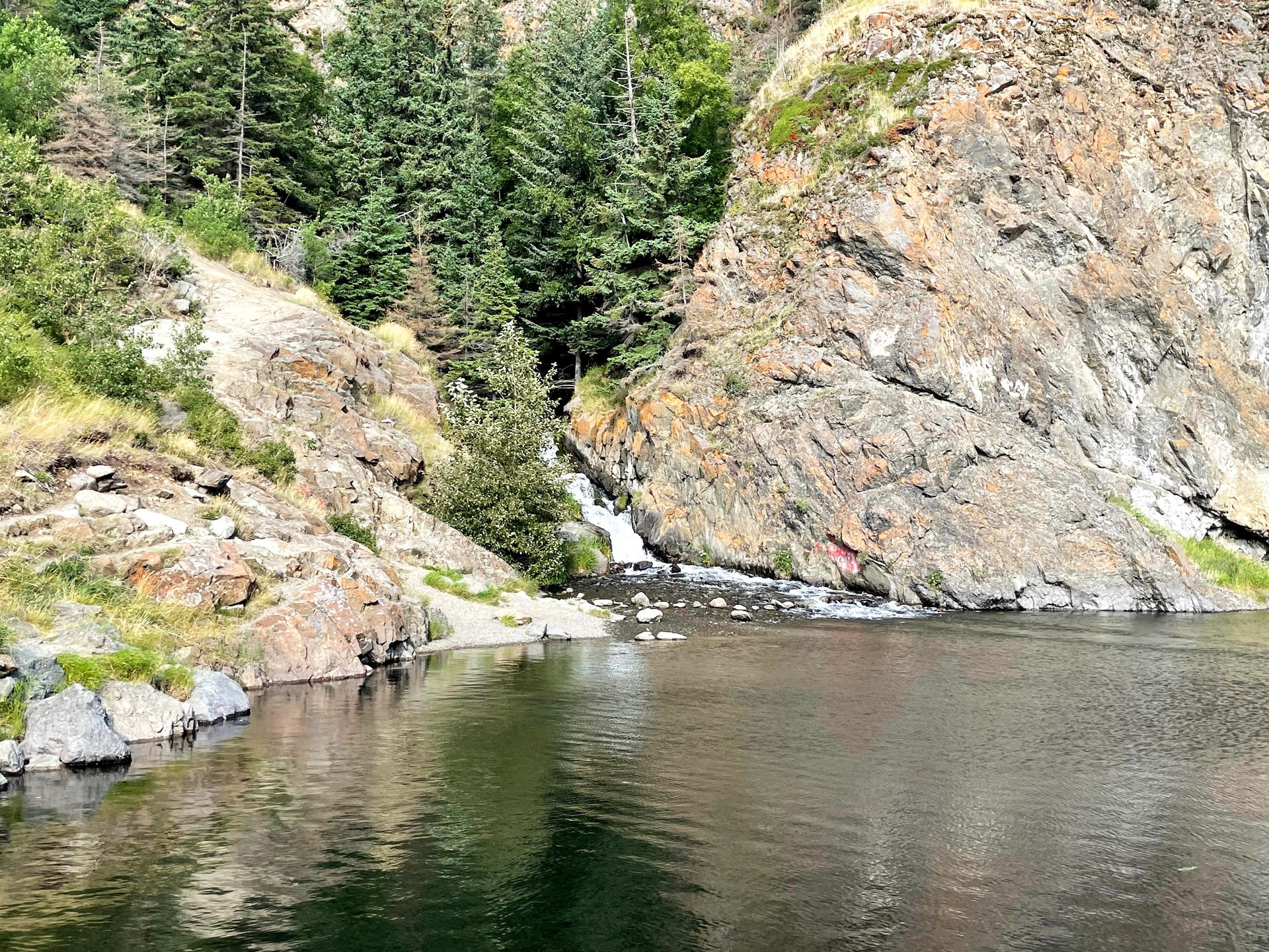 A small waterfall flowing into a pond at McHugh Creek.