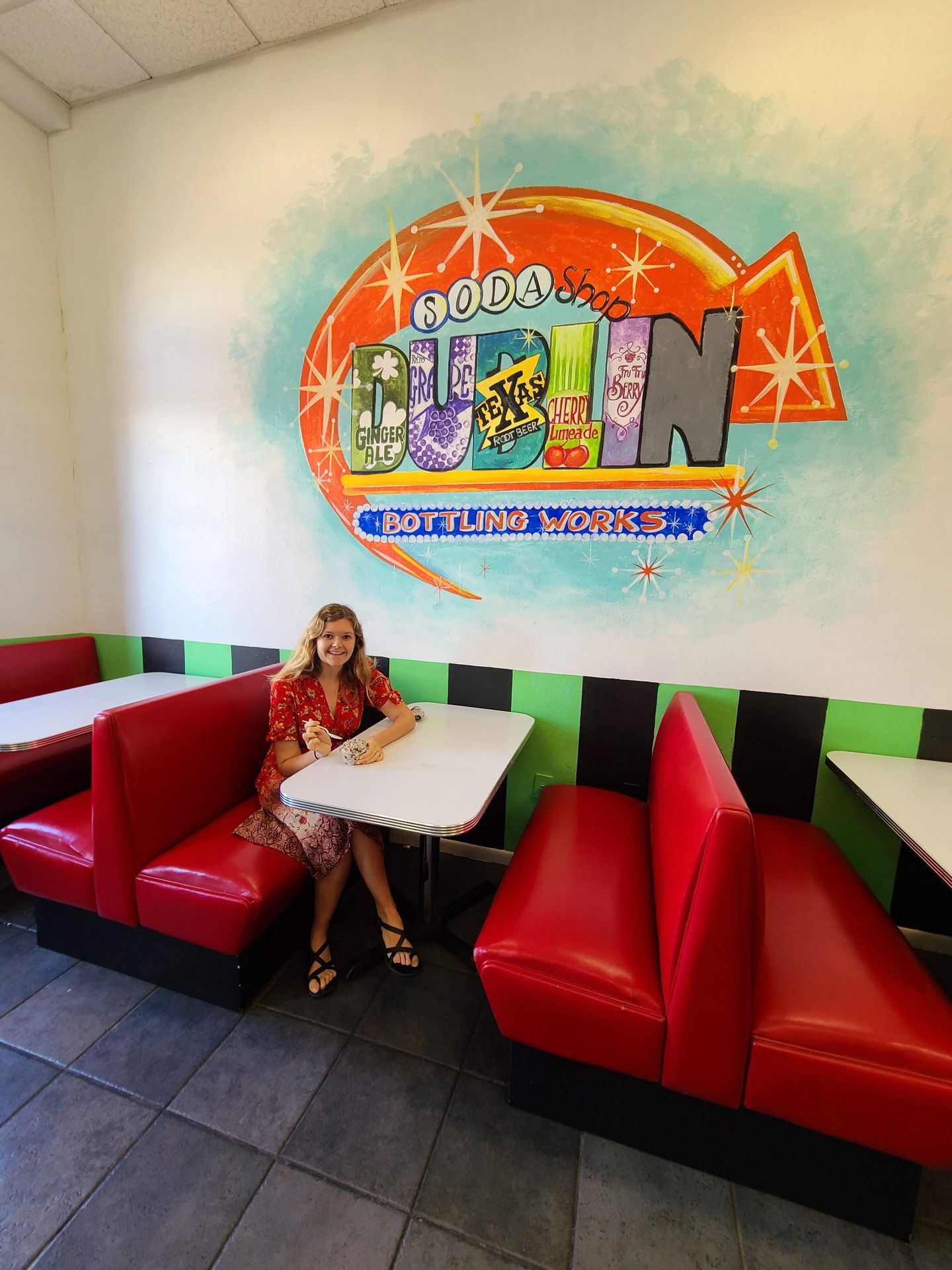 Lydia sitting in a bottle at Old Doc's Soda Shop