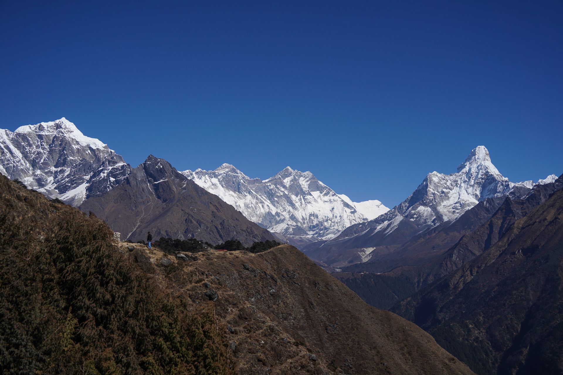A view of Mount Everest and surrounding snow capped peaks on a trail up above Namche Bazaar during the Everest Base Camp trek