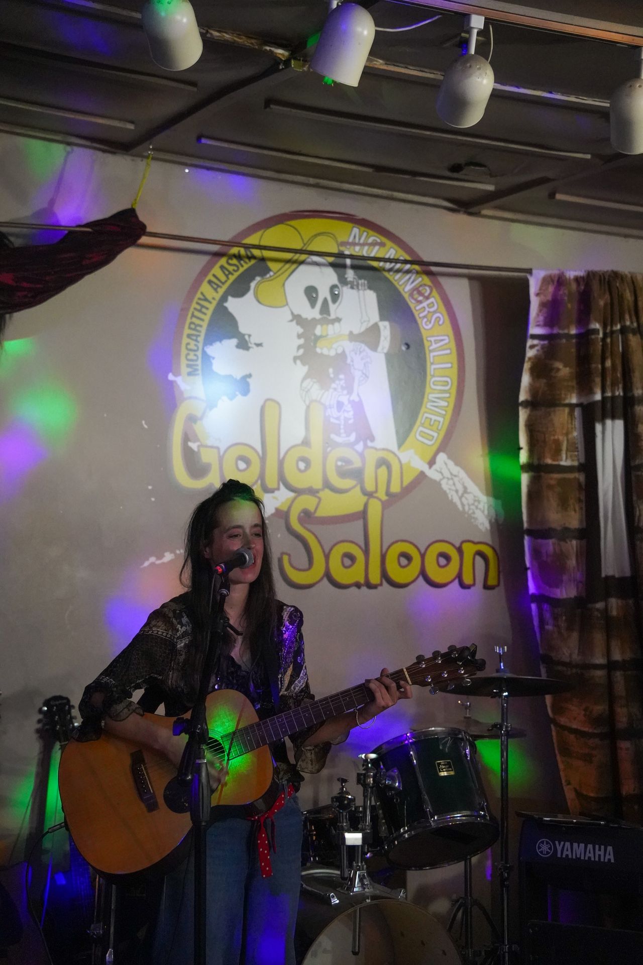 A musician playing at The Golden Saloon