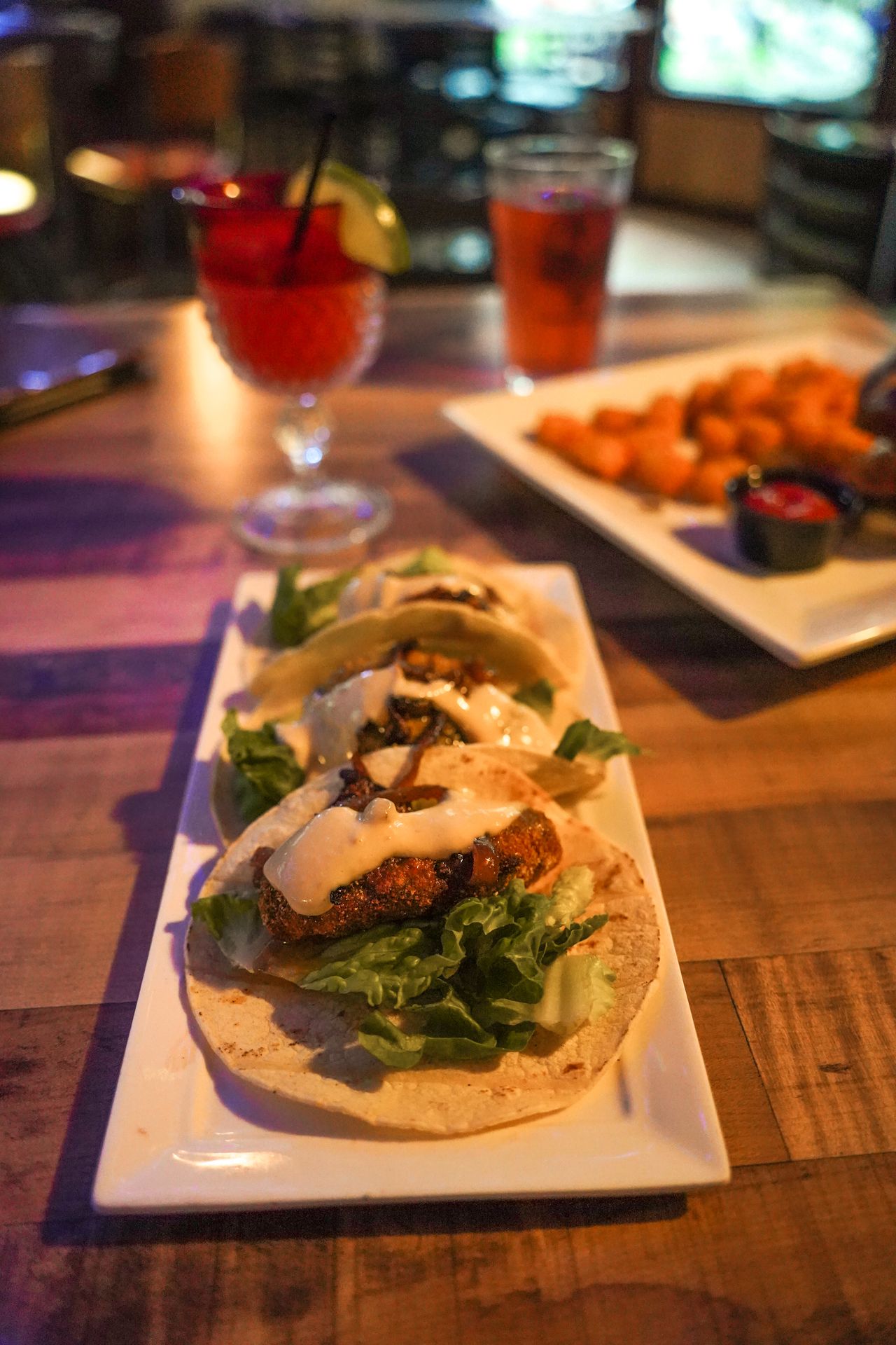 A plate of 3 tacos on a table at Pickled Loon