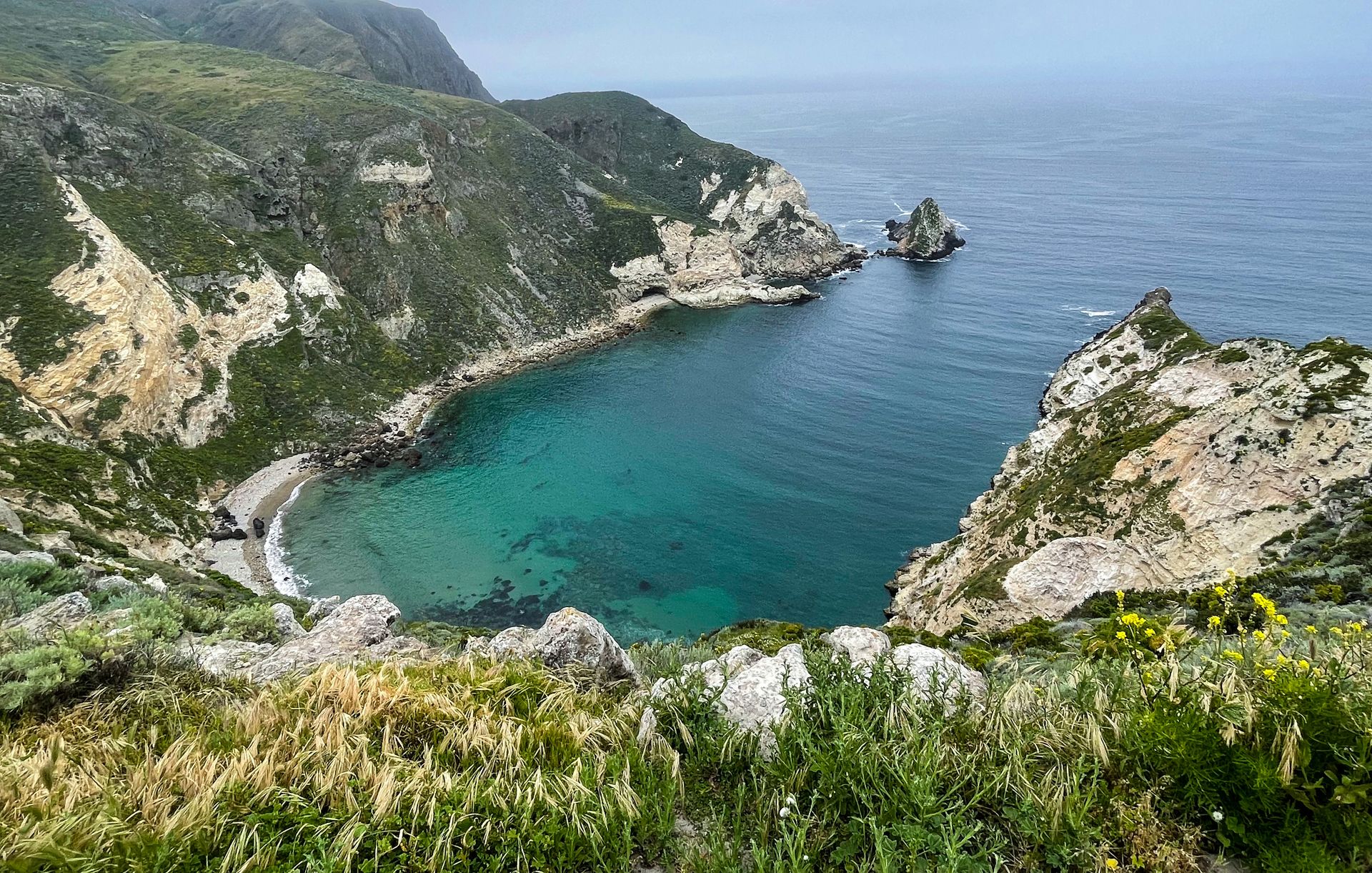 Looking down at a harbor shaped like a large potato
