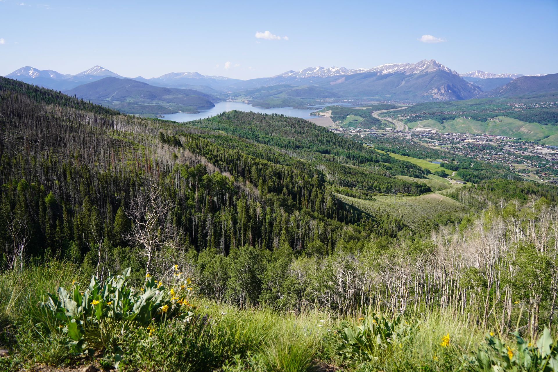 A view of Silverthorne, surrounding mountains and Dillon Reservoir from the Ptarmigan Trail in Silverthorne