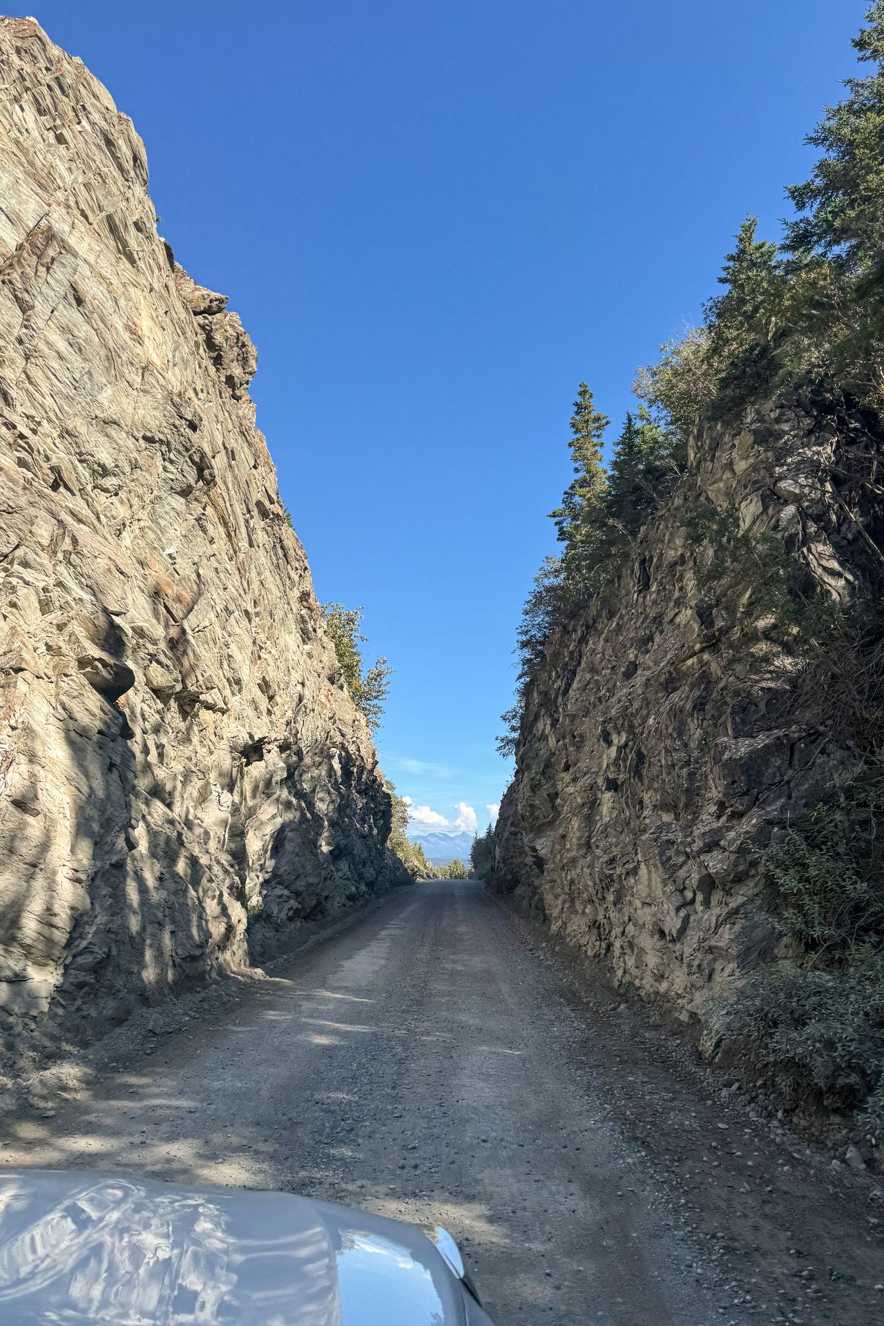 A narrow railroad rock tunnel at the beginning of the McCarthy Road