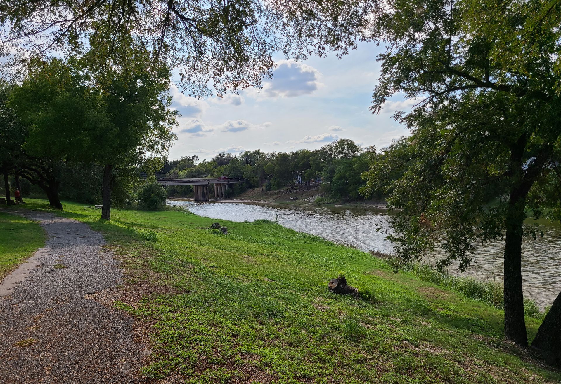 A path next to a river at the Paluxy Heritage Park.