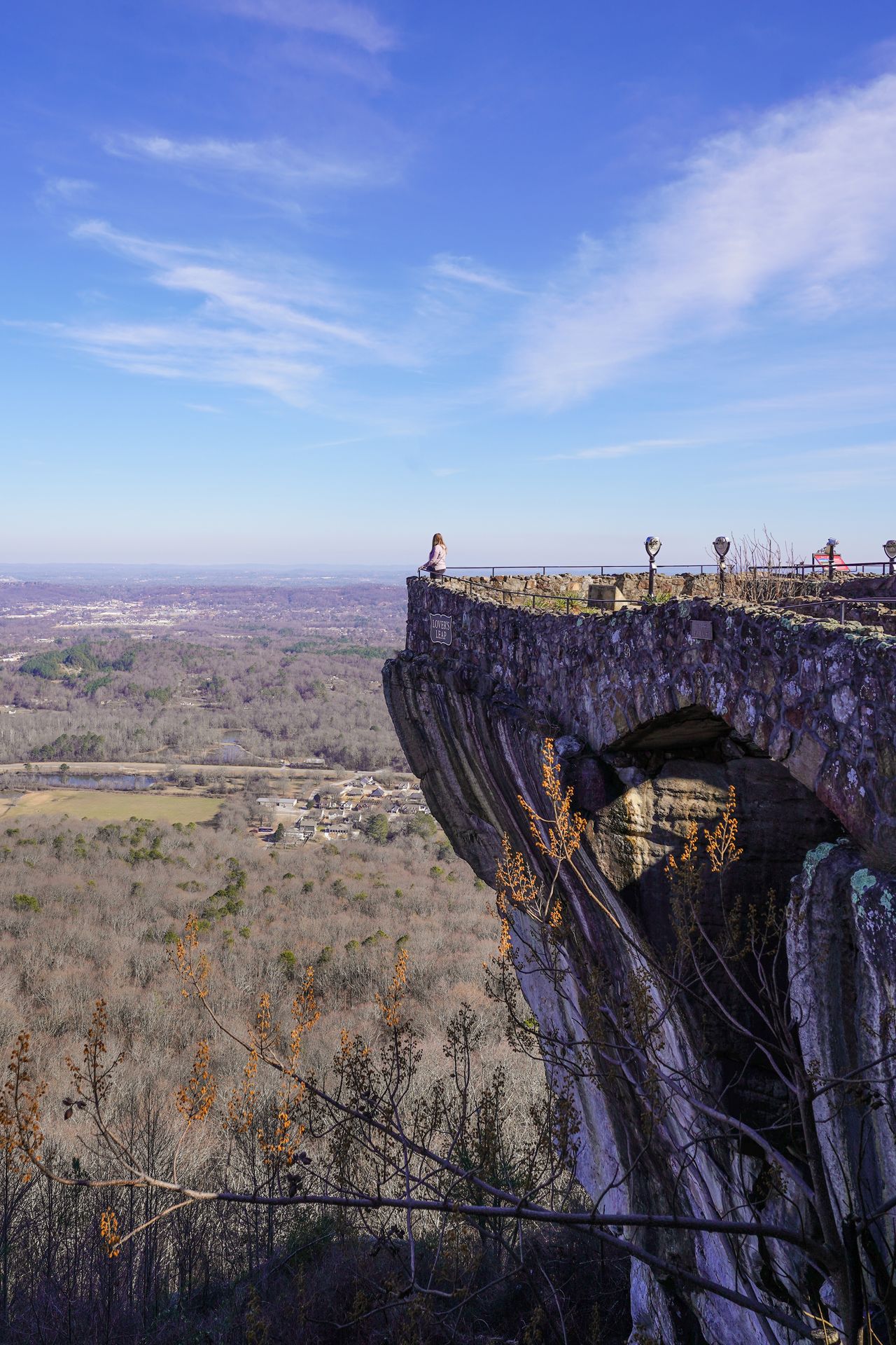 Lydia on a ledge in Rock City in Chattanooga
