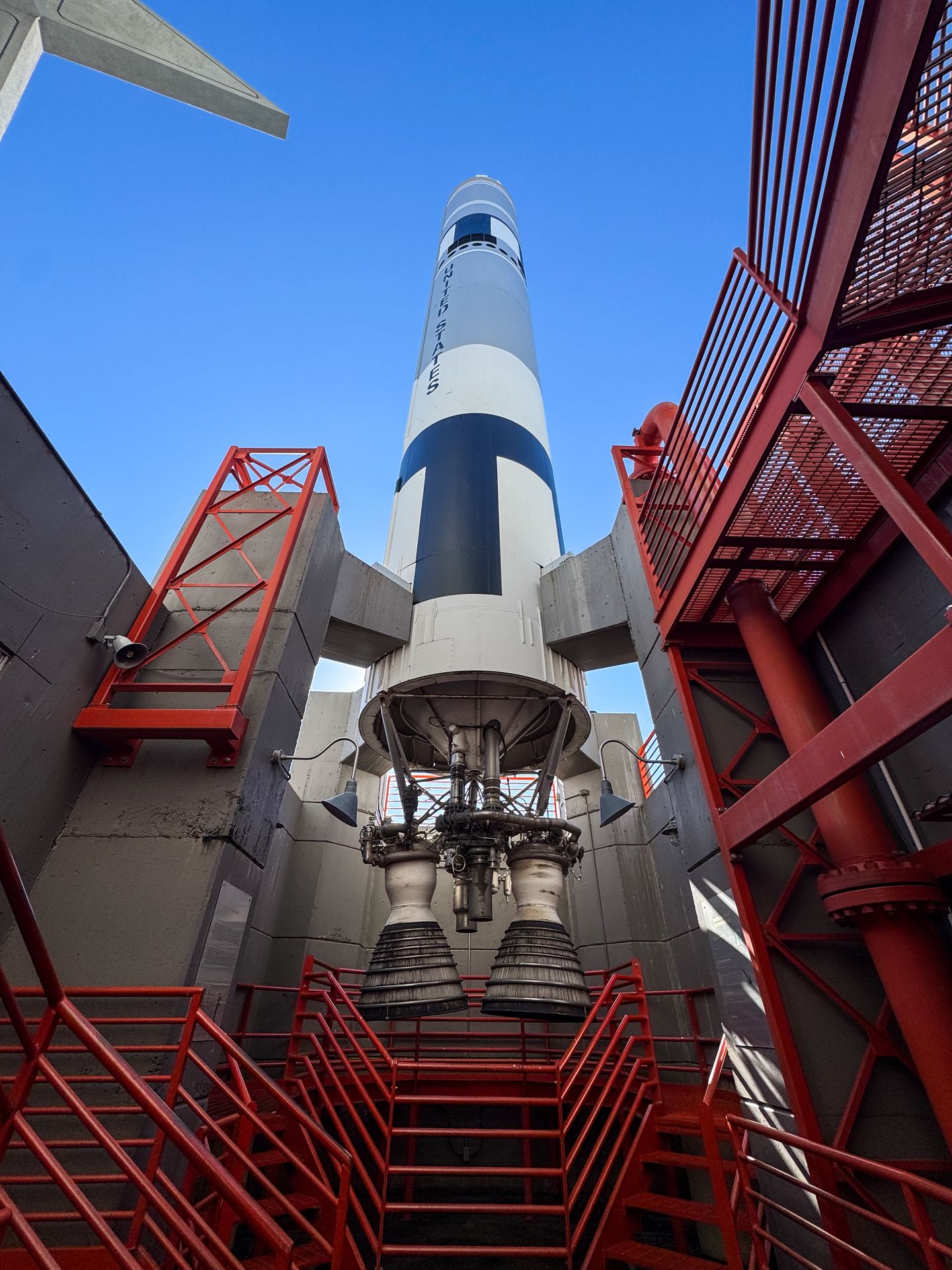 Looking up at a large replica of a rocket at Cosmosphere
