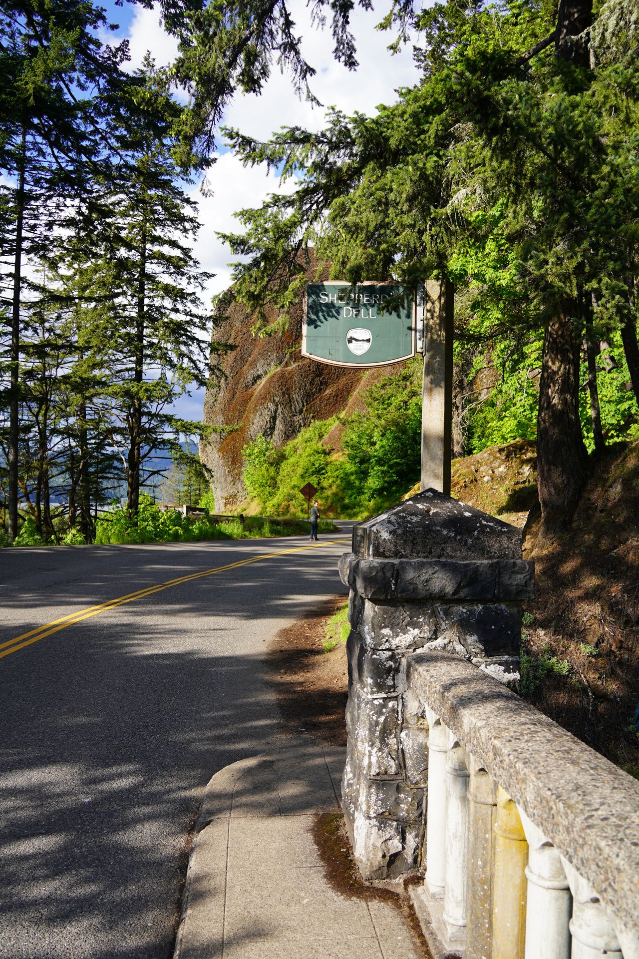 A sign for Shepperd's Dell Falls along the road