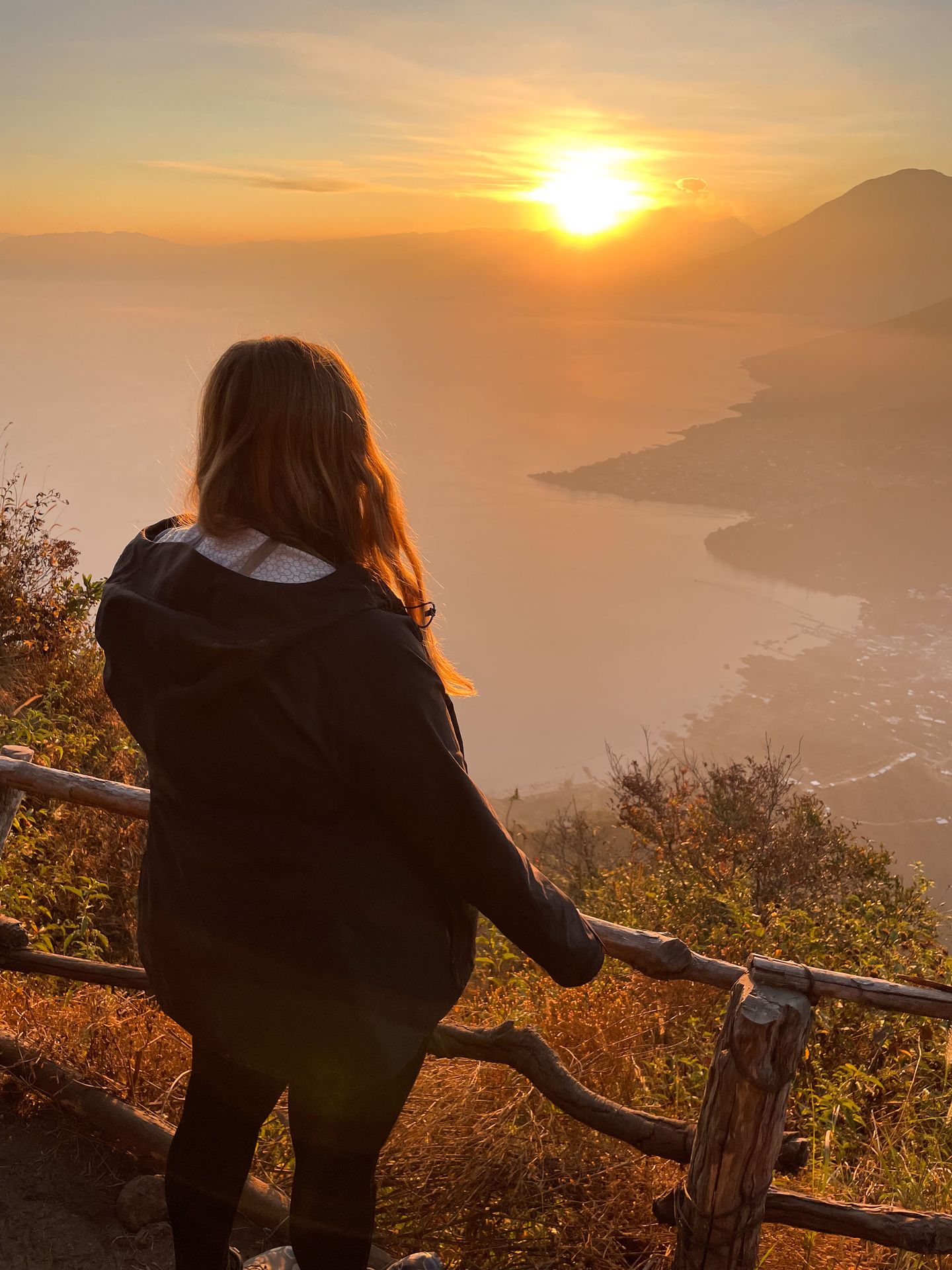 Lydia looking out at the sunrise from Indian Nose