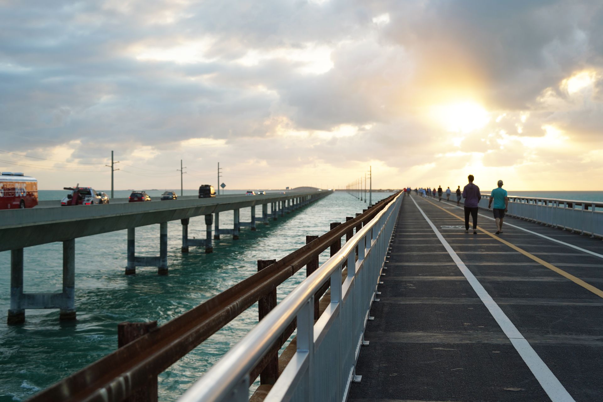 The sun setting over the Seven Mile Pedestrian Bridge. You can see the seven mile car bridge on the left.