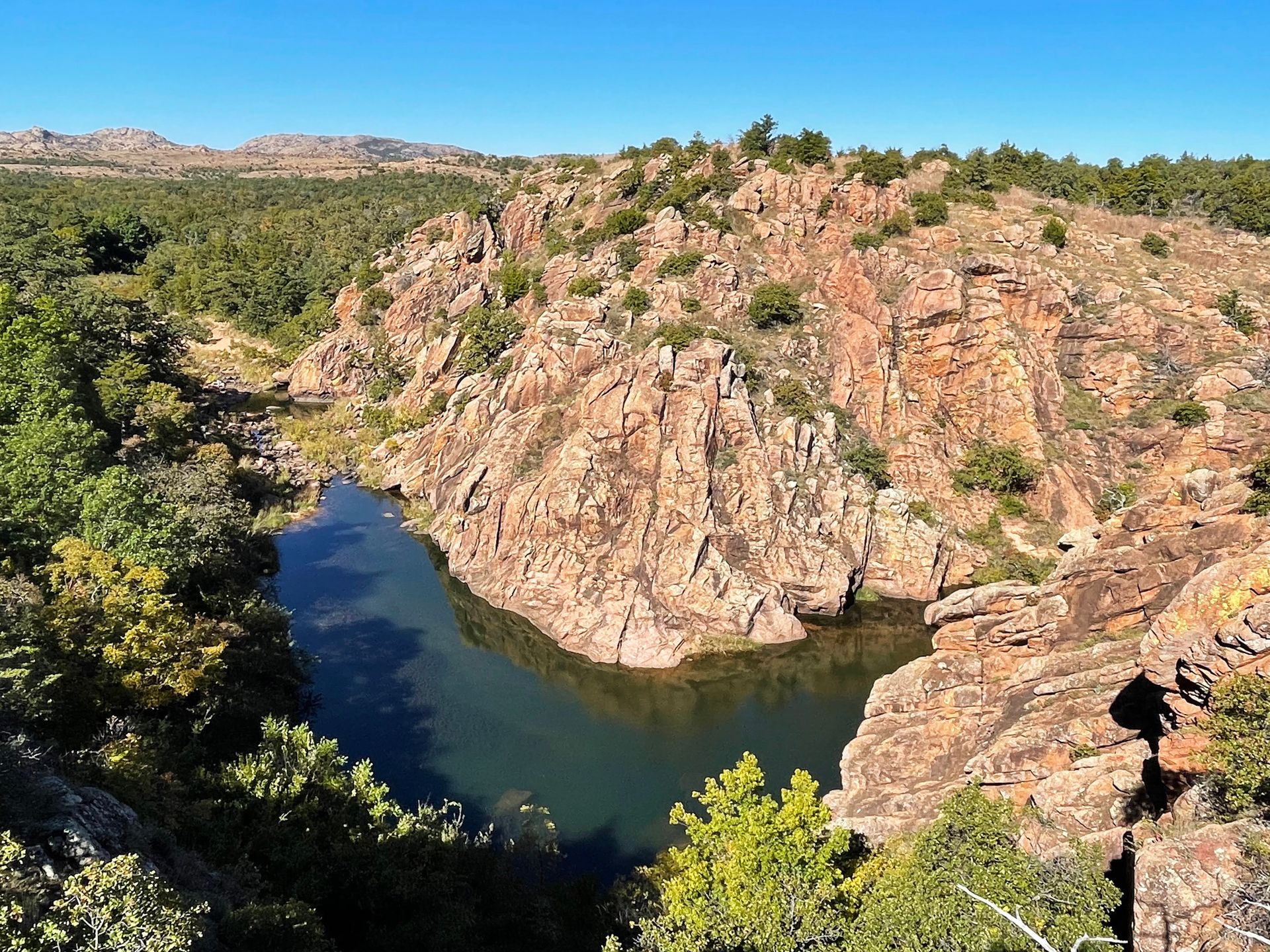 A view looking down at a river flowing through rocks on The Narrows trail.