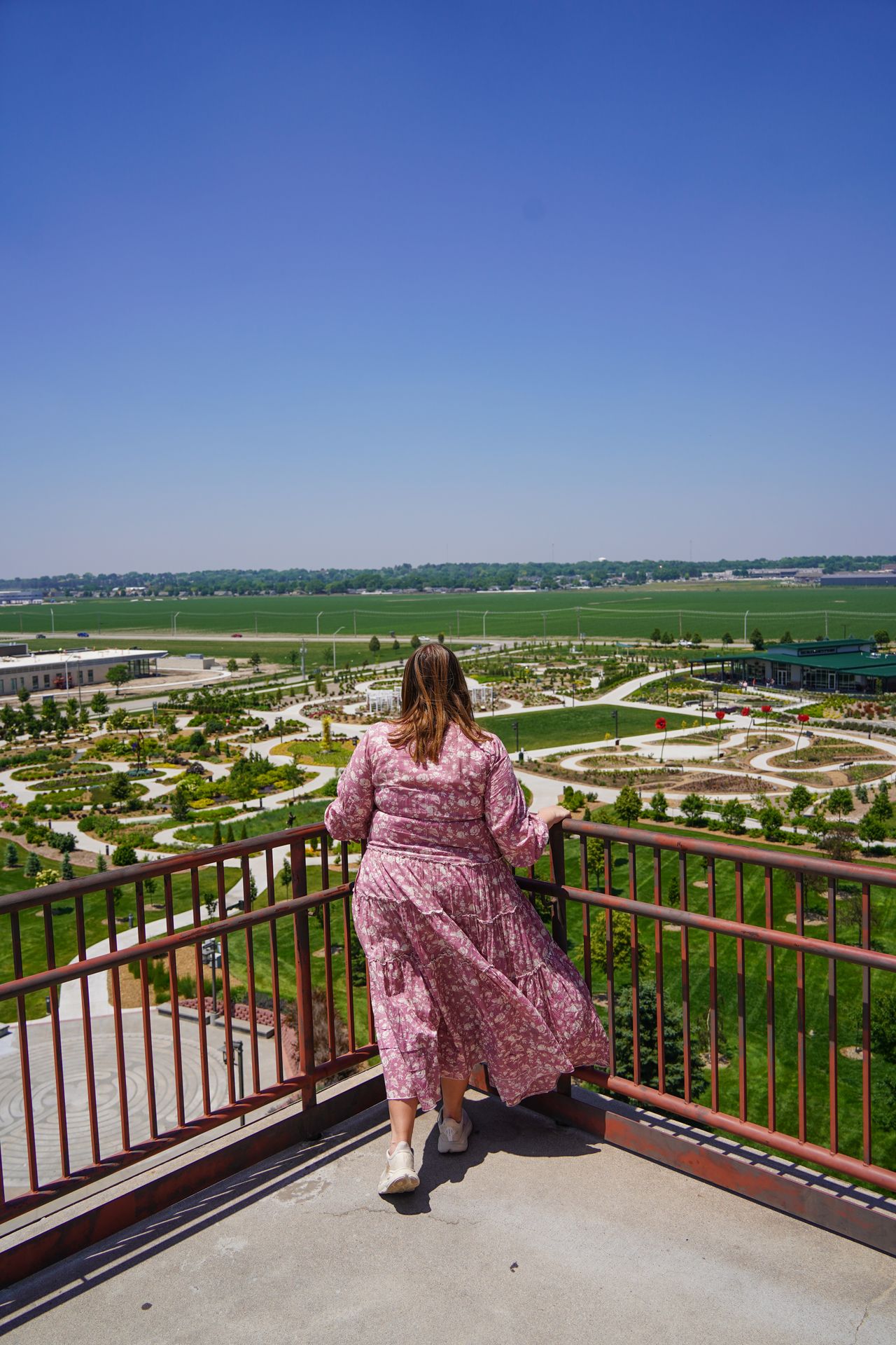 Lydia on top of the observation tower in Yanney Park, looking out at the view