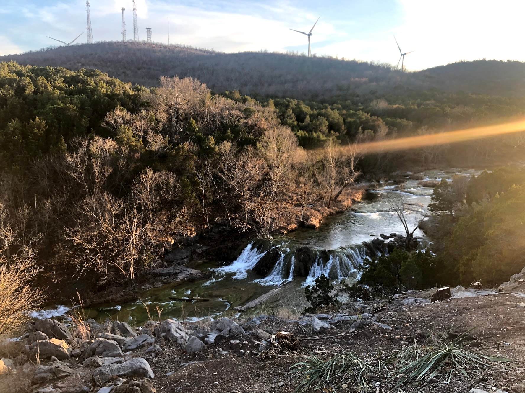 A view of a waterfall from an overlook in Turner Falls.