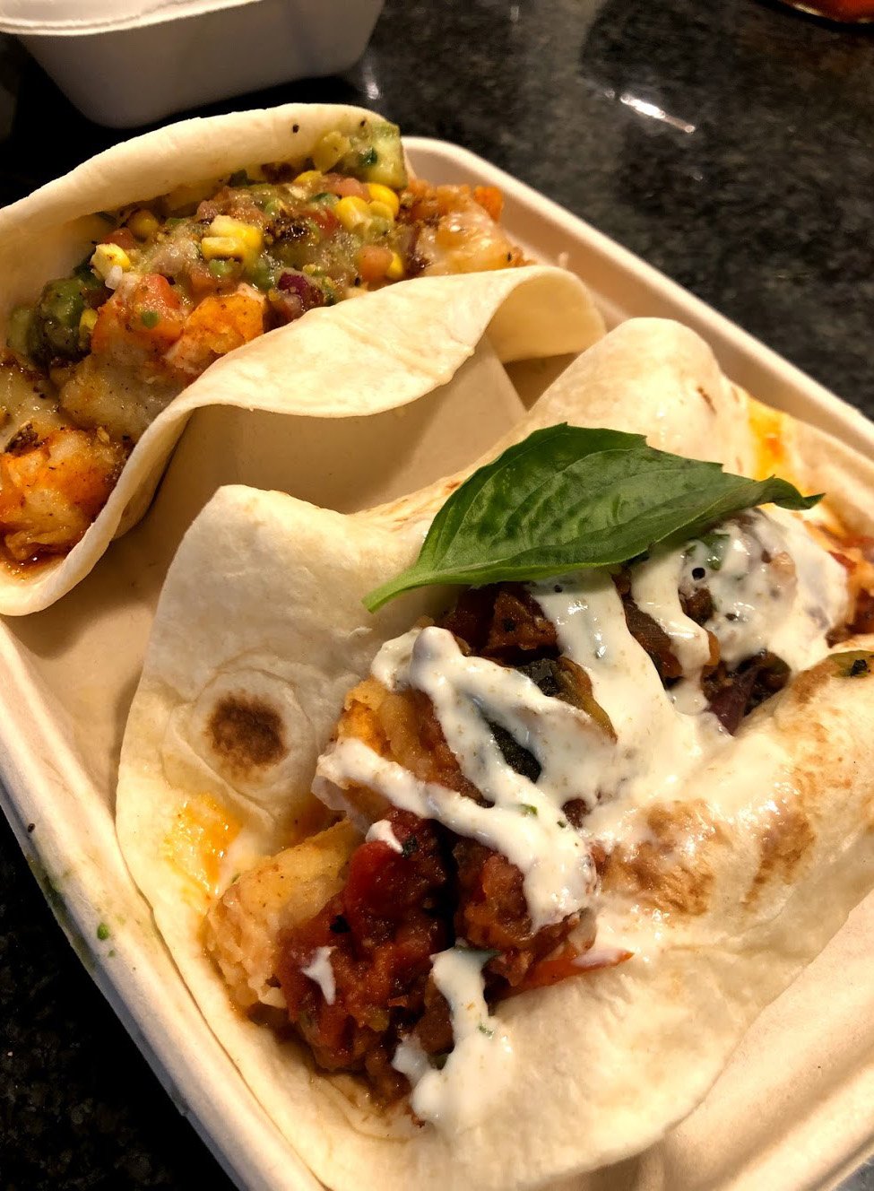 A close view of some tacos from Velvet Taco.