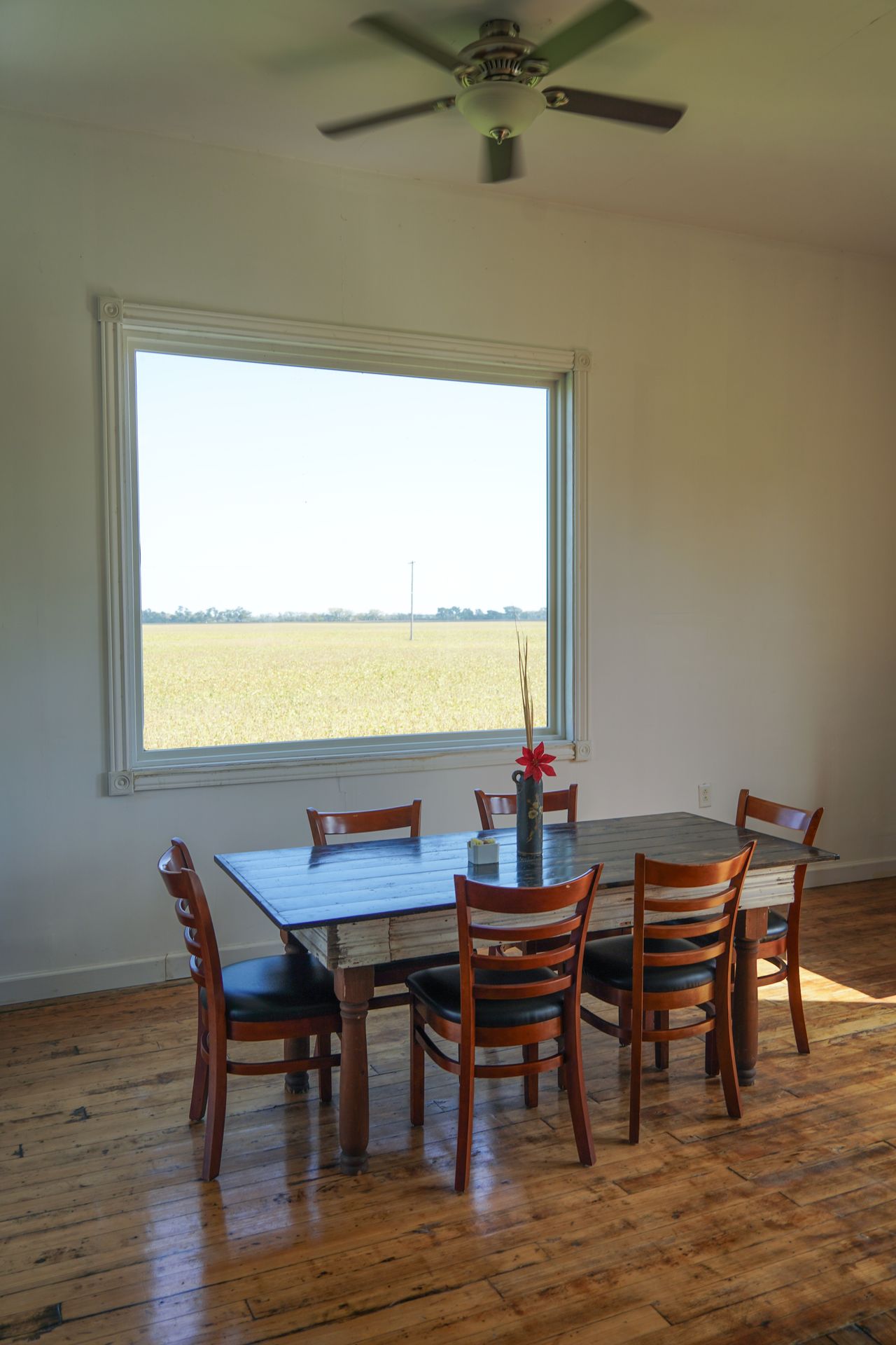 A scenic window next to a table inside Chef Stan's Place